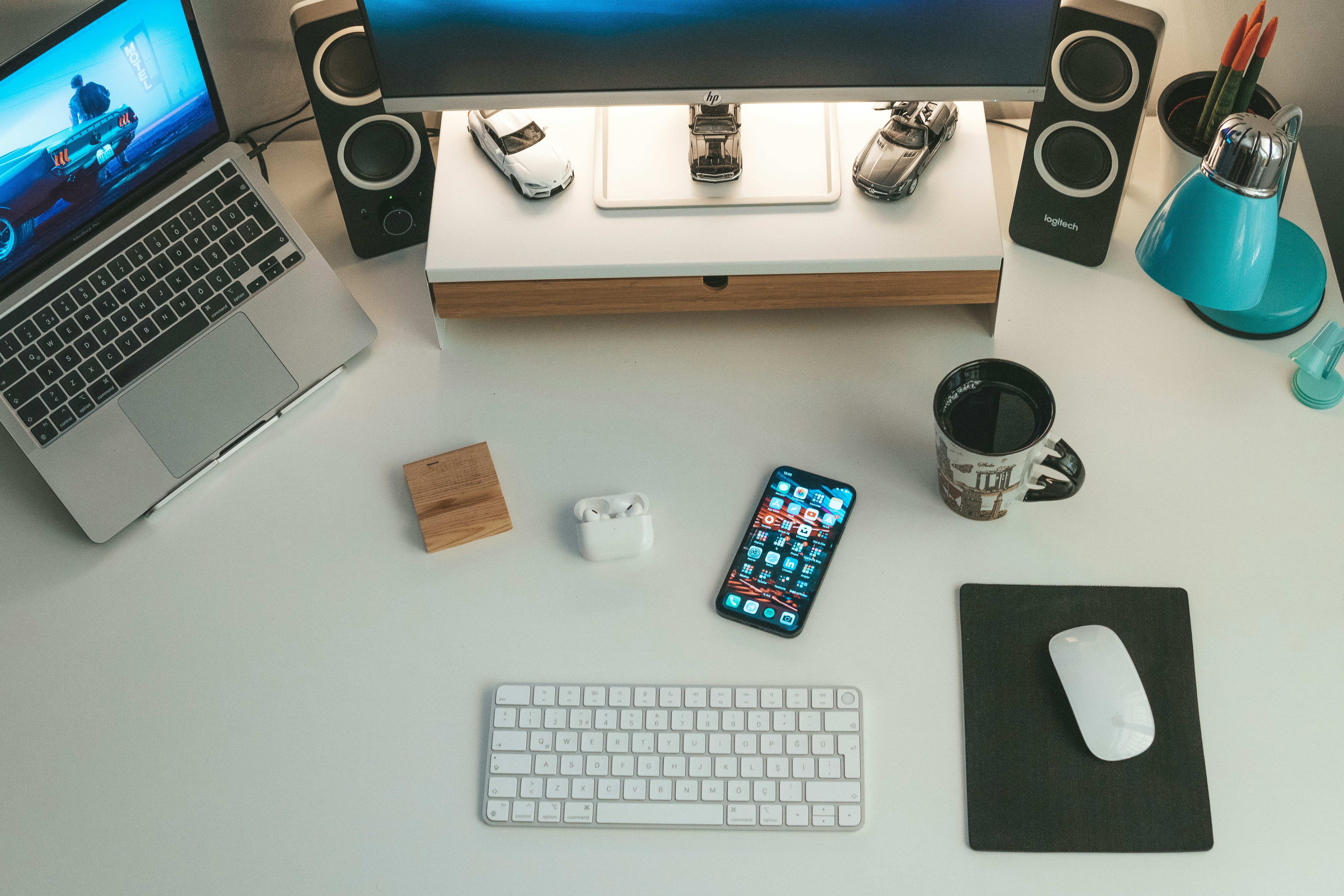 Workspace with laptop and phone