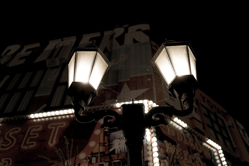 a street light with a sign above it