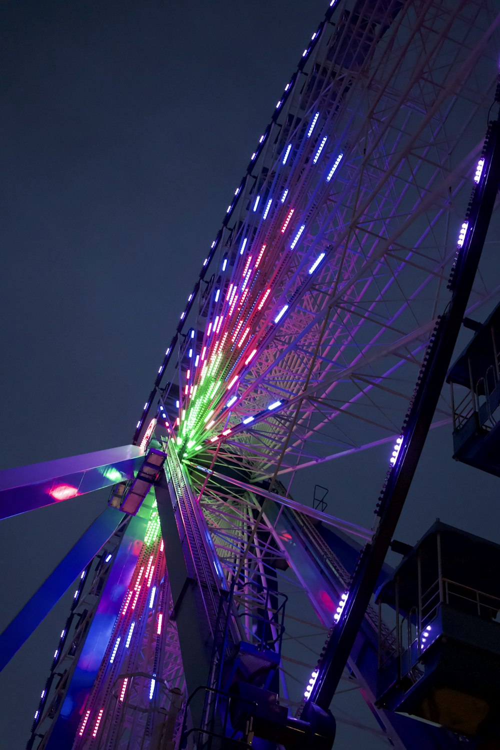 a ferris wheel at night