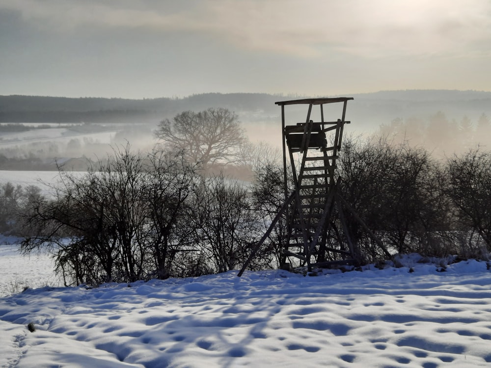 a structure in a snowy field