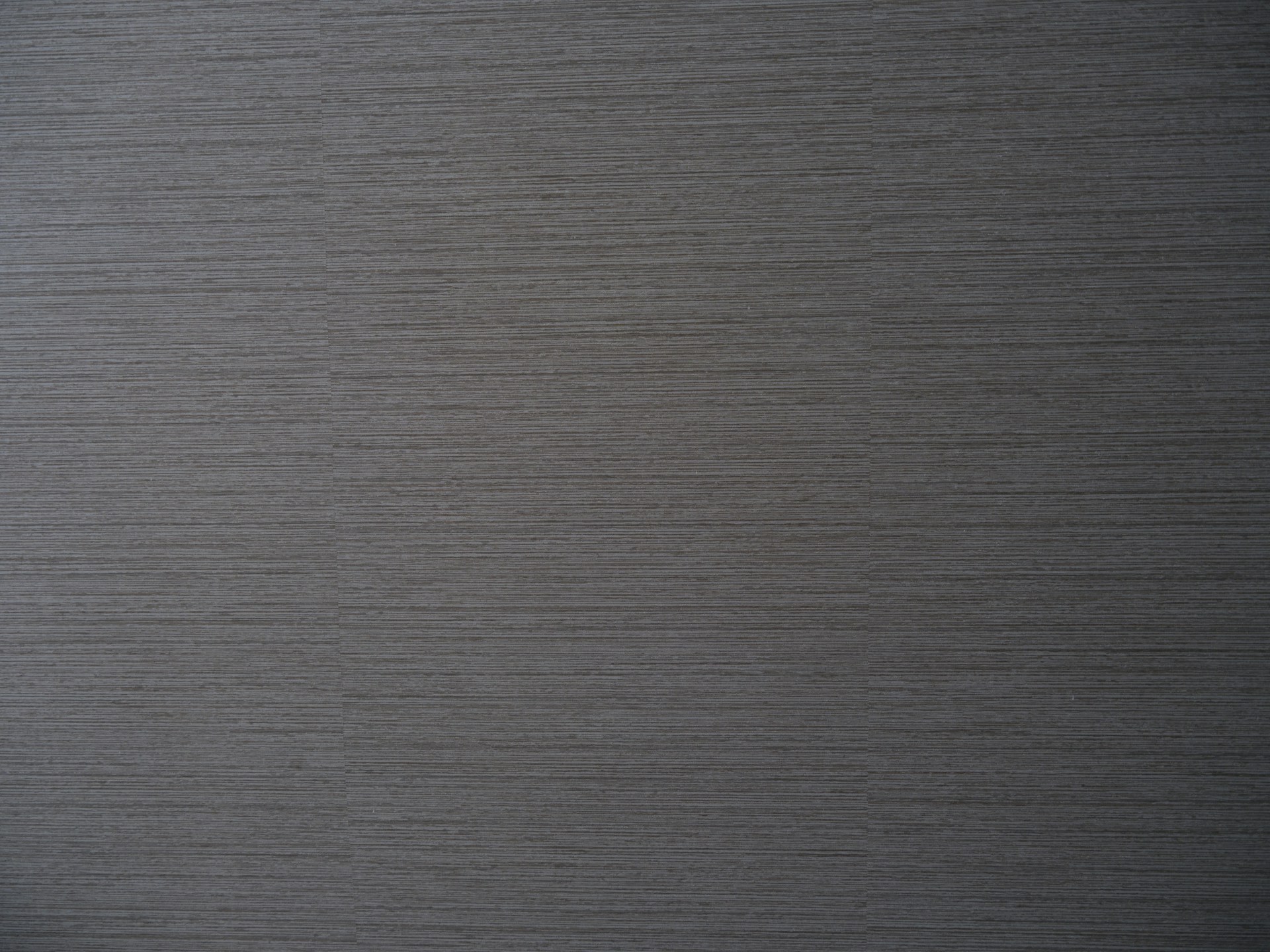 a close up of a grey surface