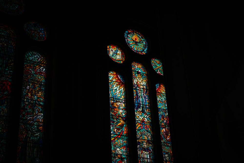 a group of stained glass windows