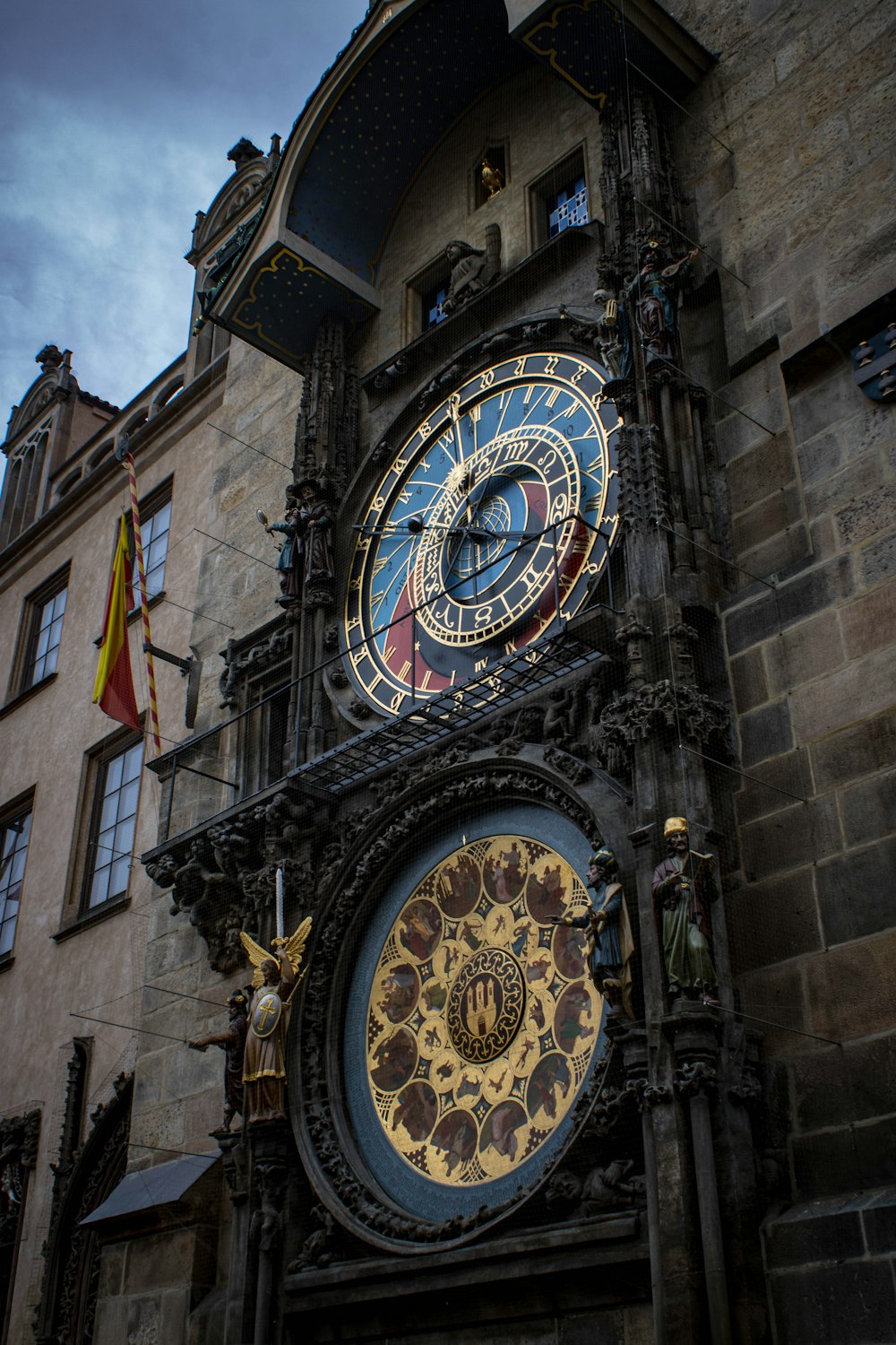 a large clock on a stone building