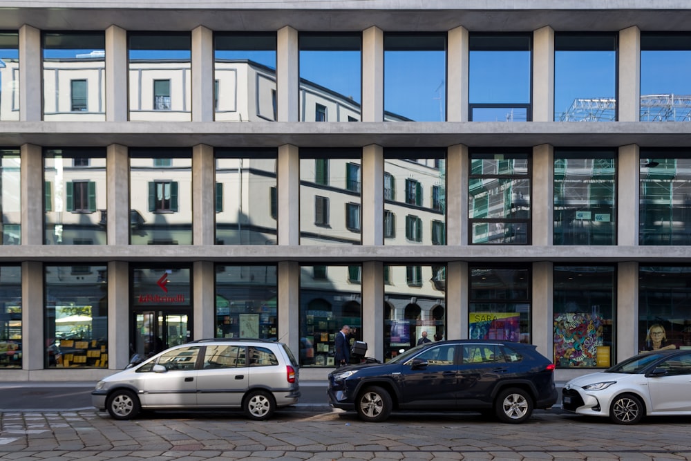 cars parked in front of a building