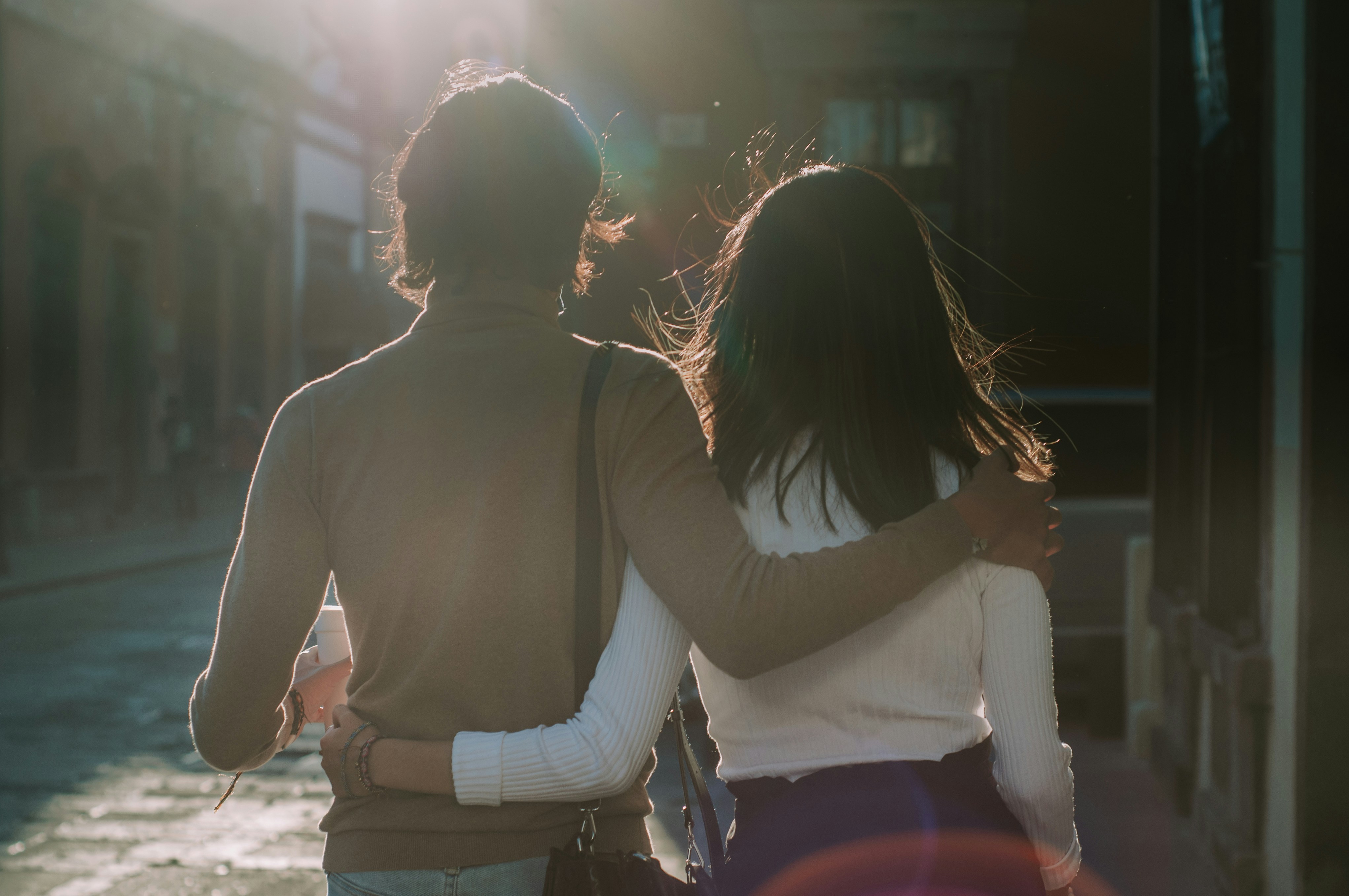 a couple of people hugging