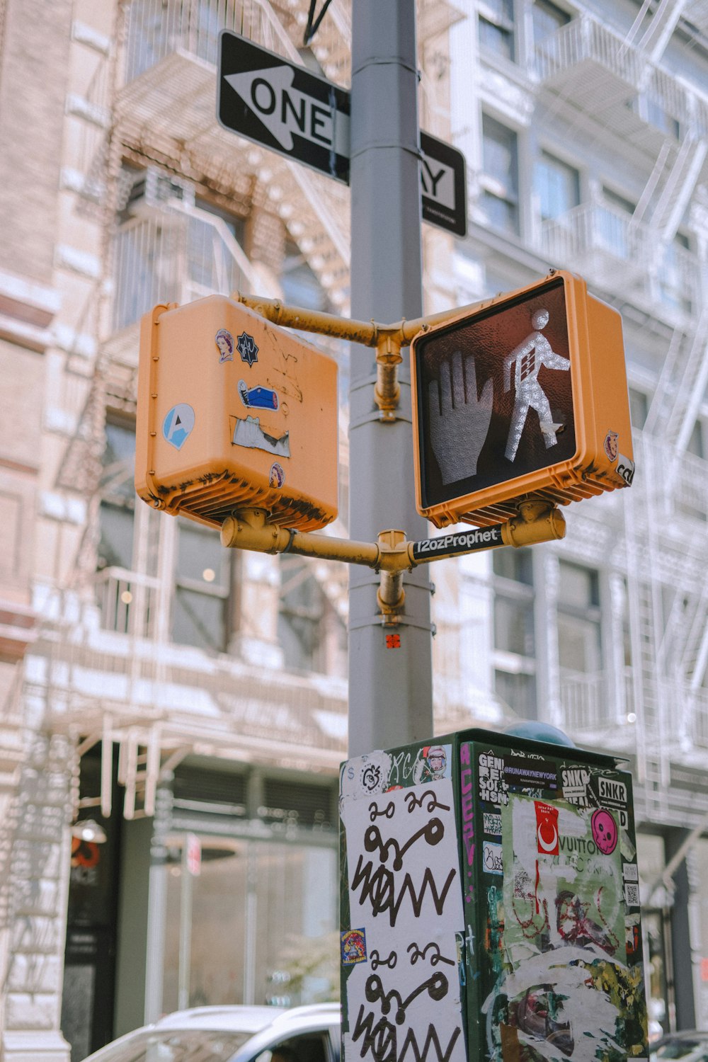 a street sign is posted on a pole