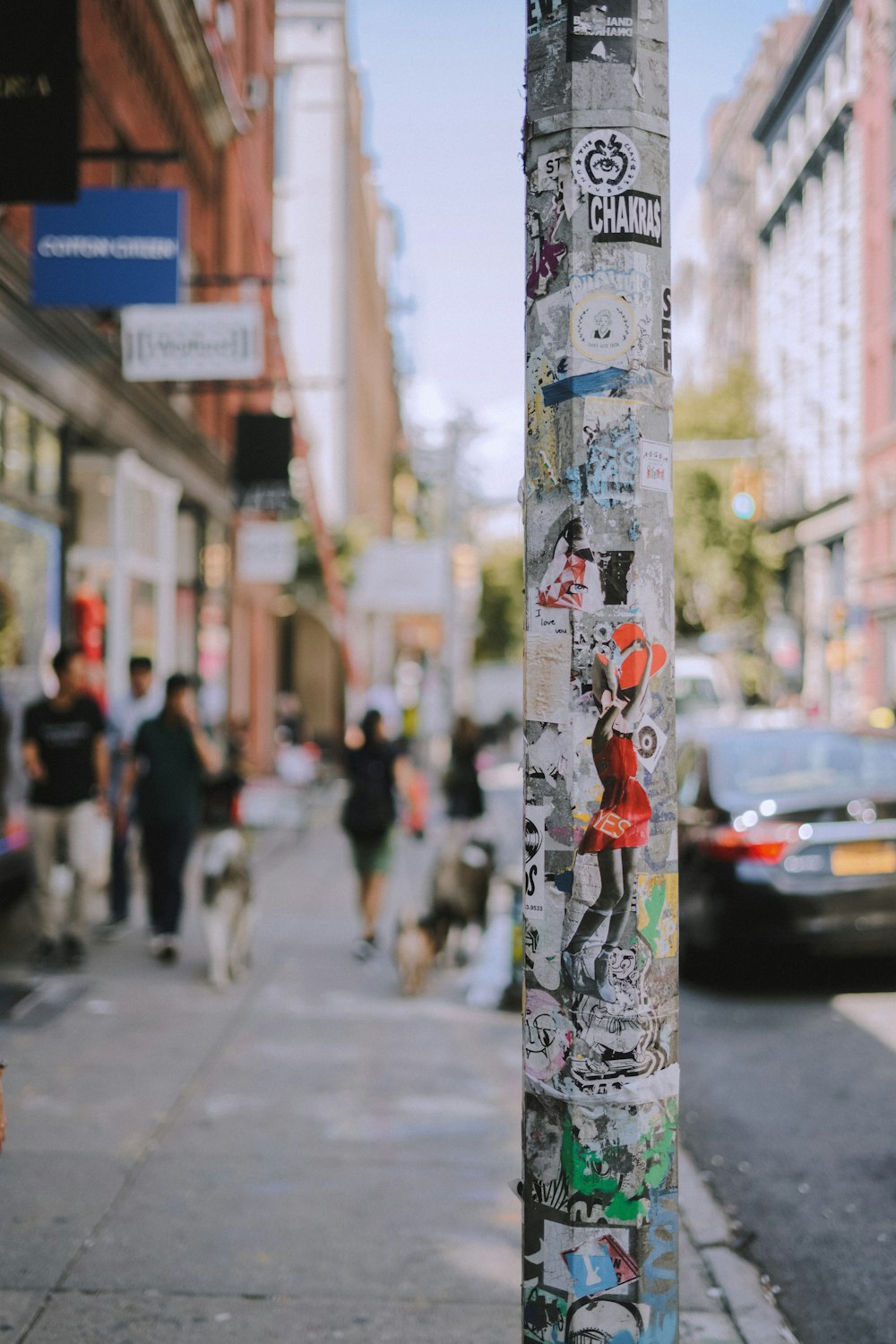 a pole with stickers on it