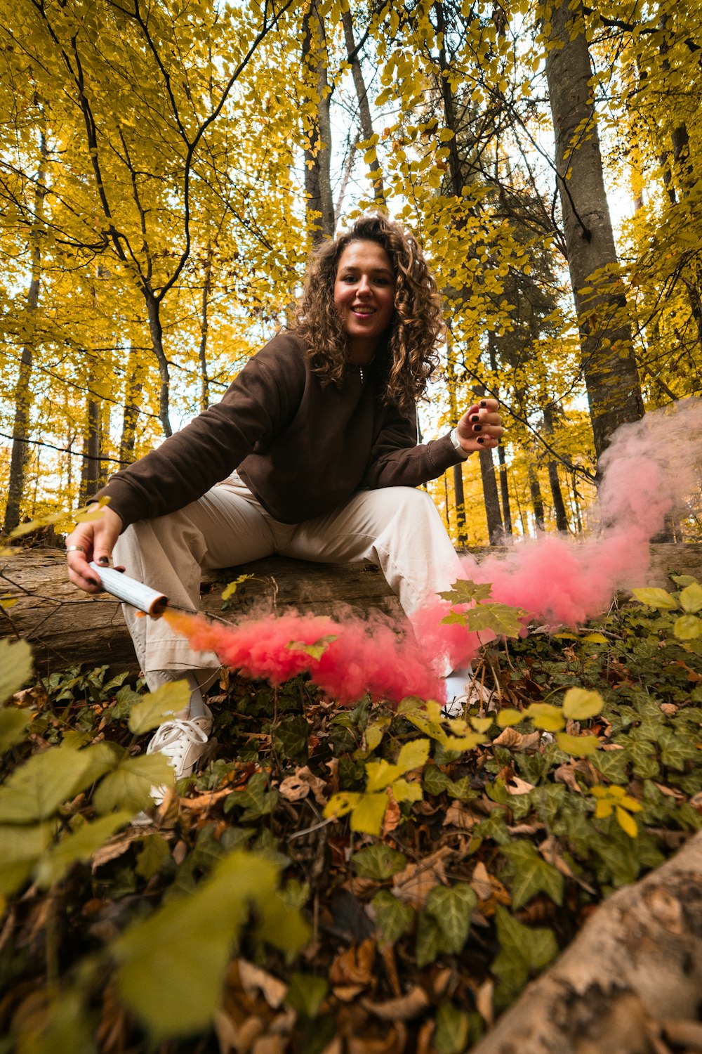 a person sitting on a rock