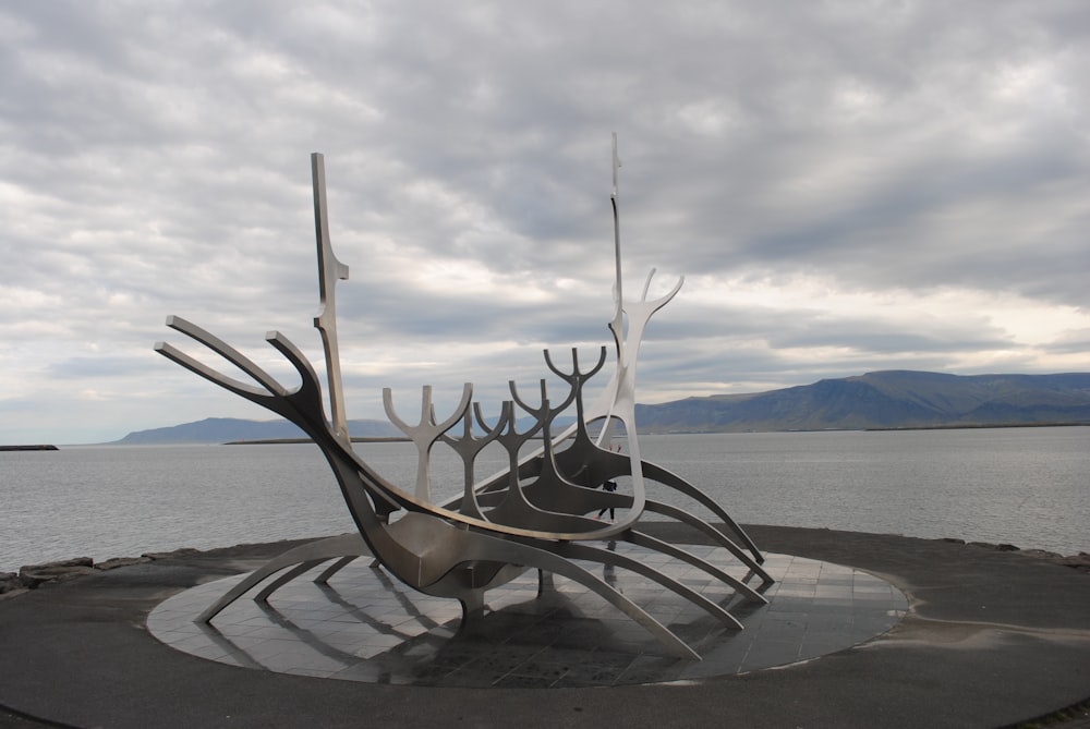 a sculpture on a beach