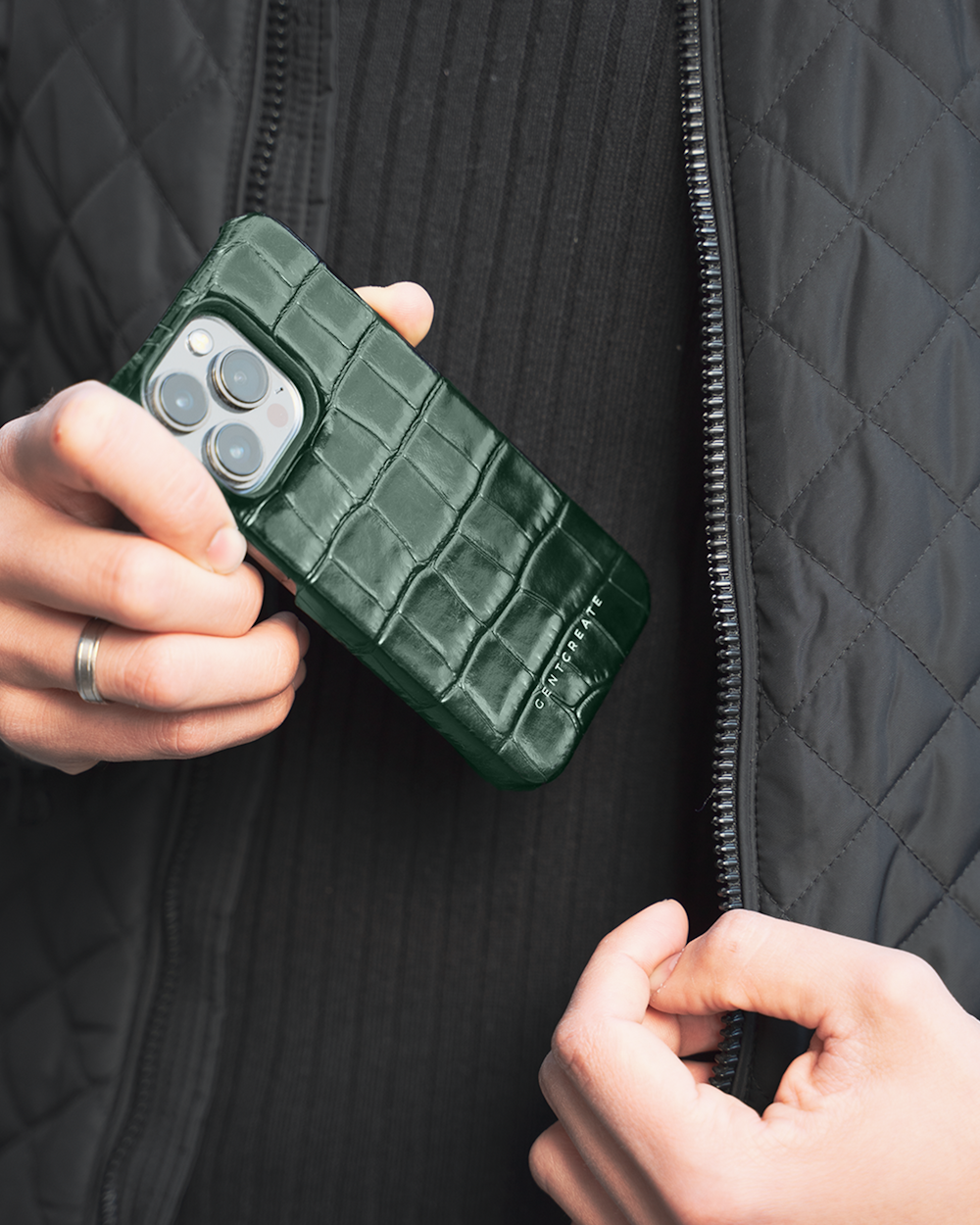 a person holding a green box