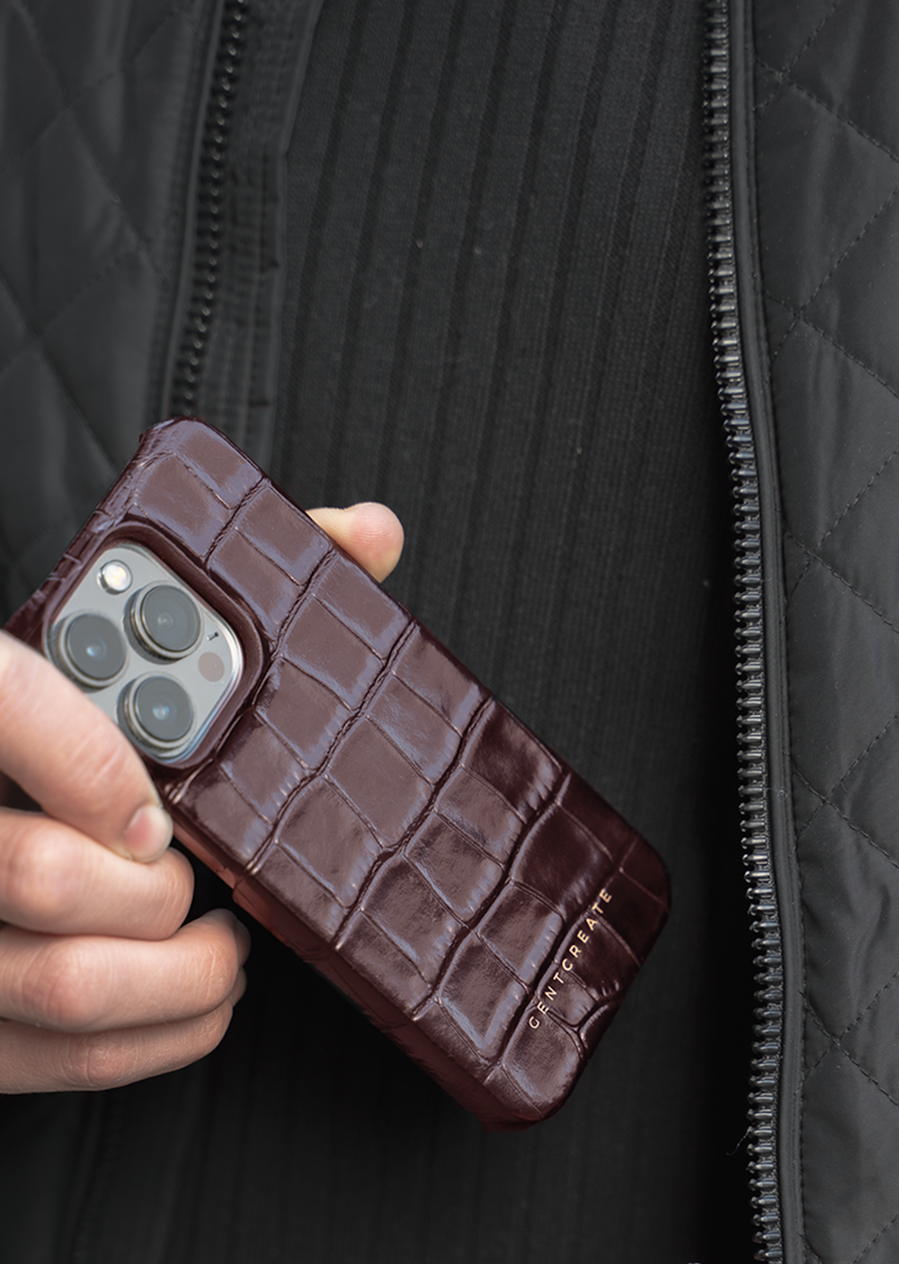 a person holding a brown leather wallet