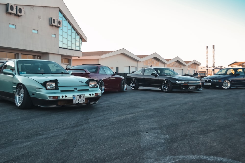 a group of cars parked outside a building