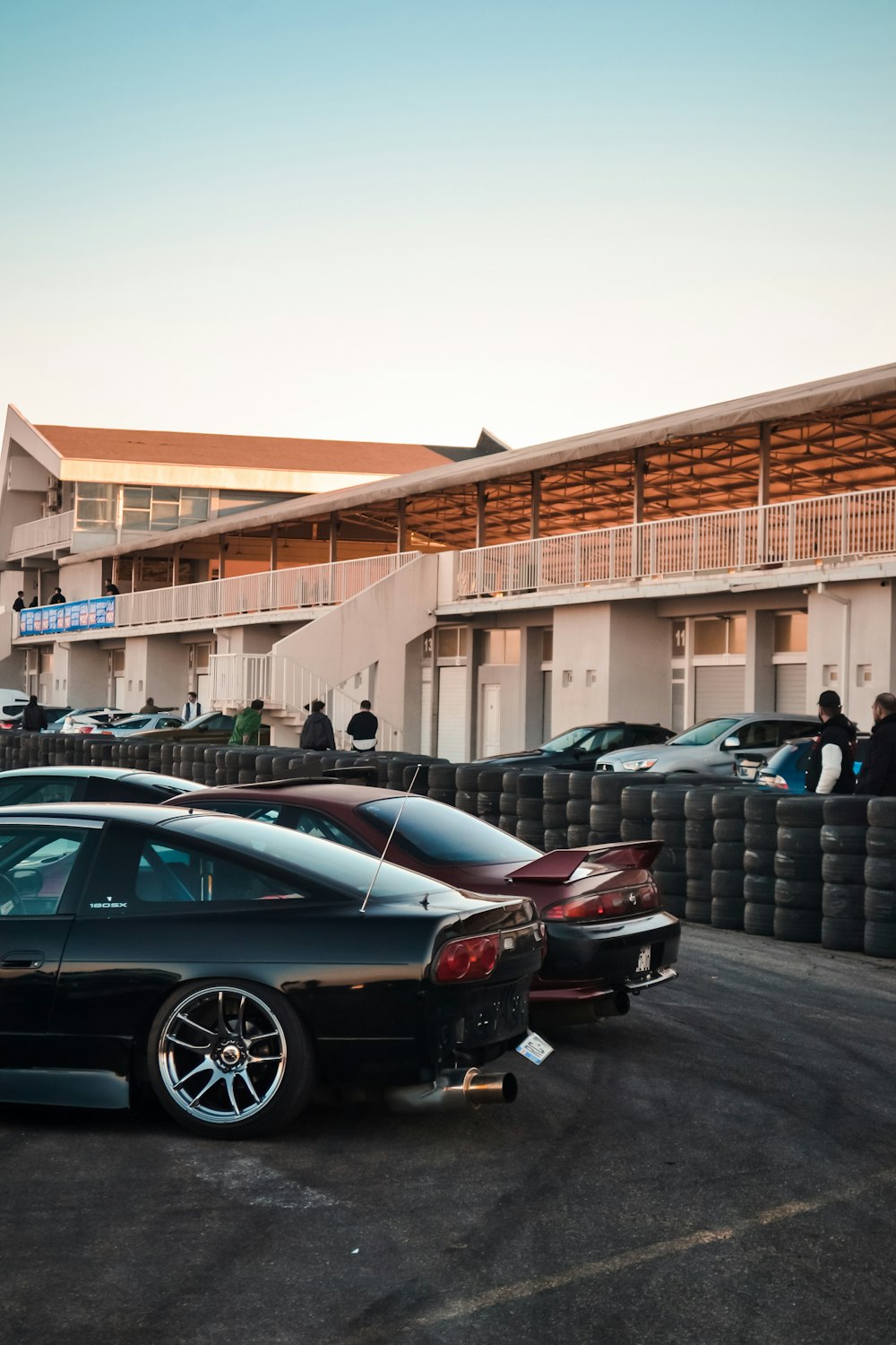 a group of cars parked outside a building