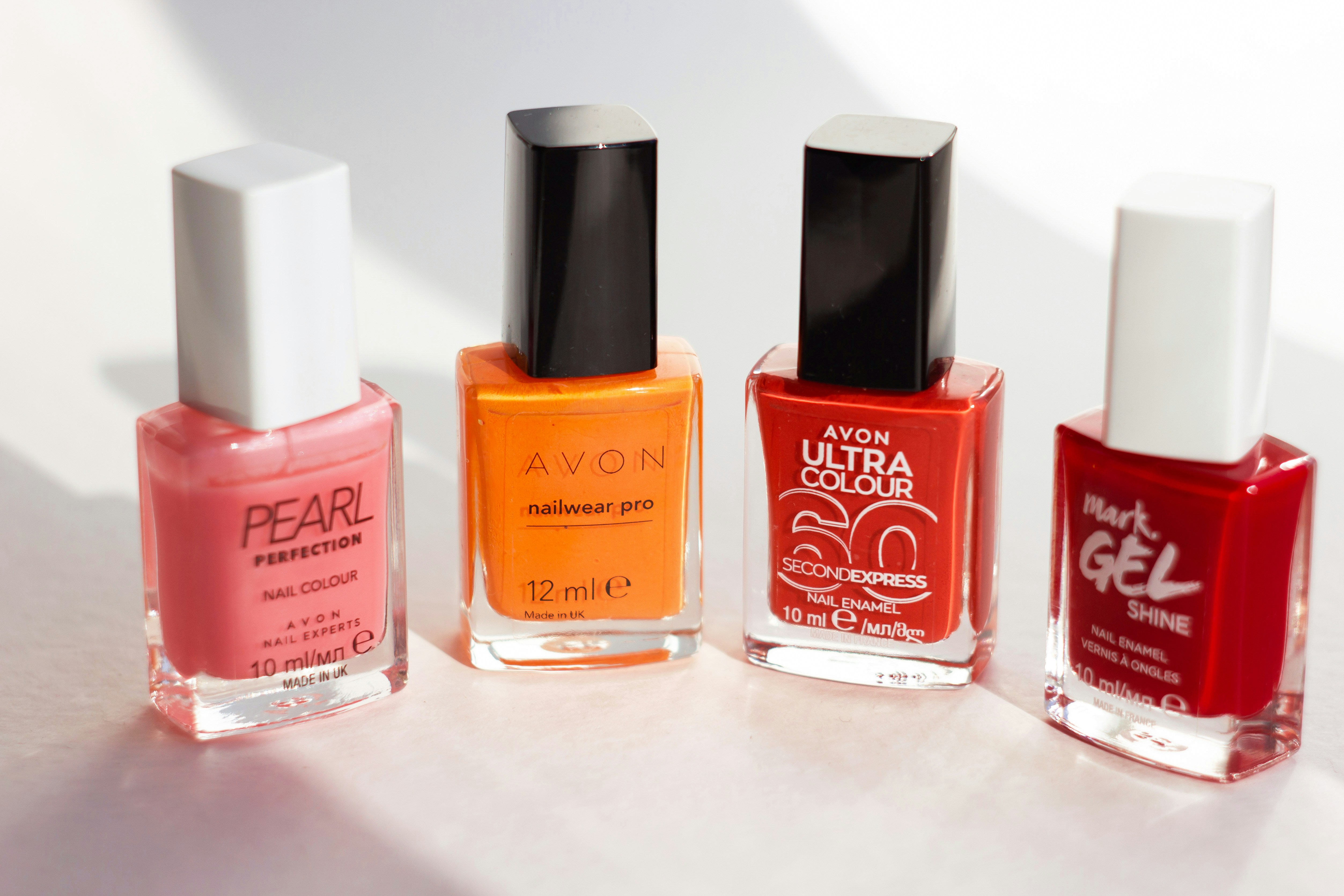 Orange Red Nail Polish Bottle