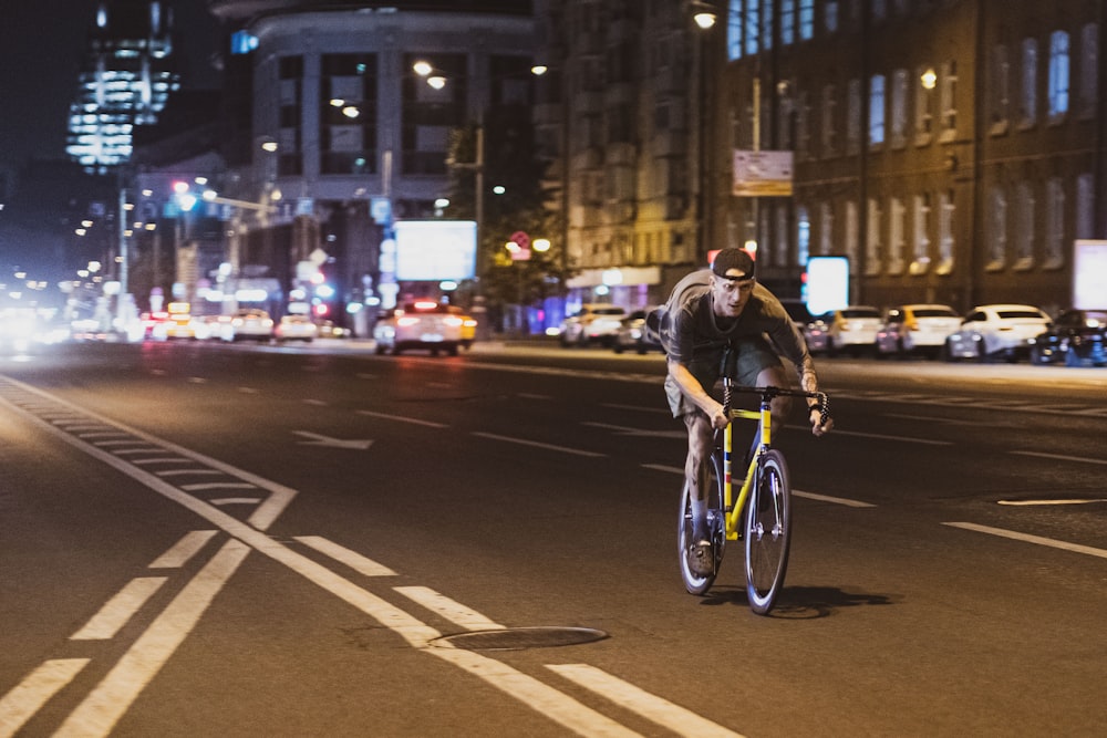 a person riding a bicycle on a city street