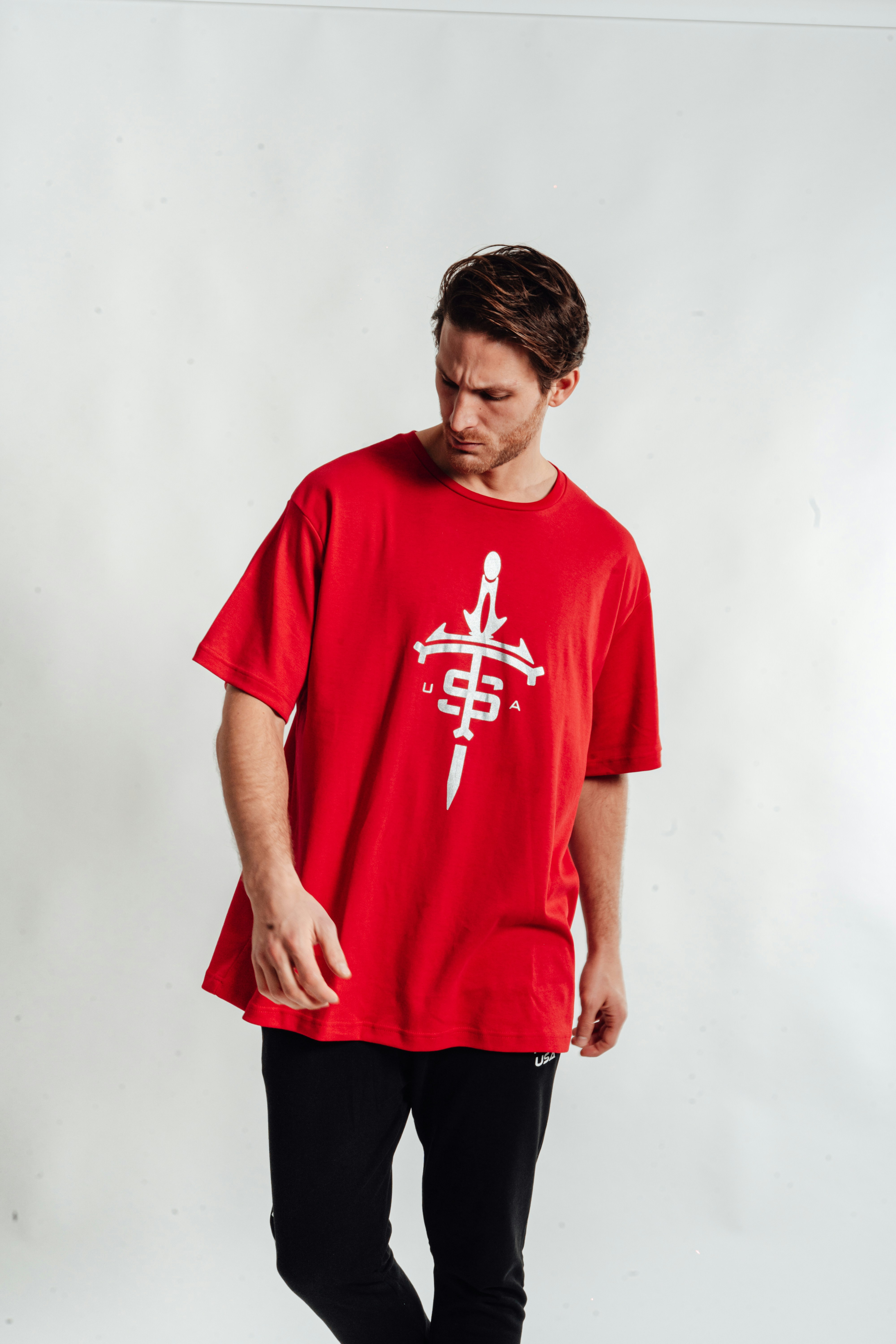 a man wearing a red shirt