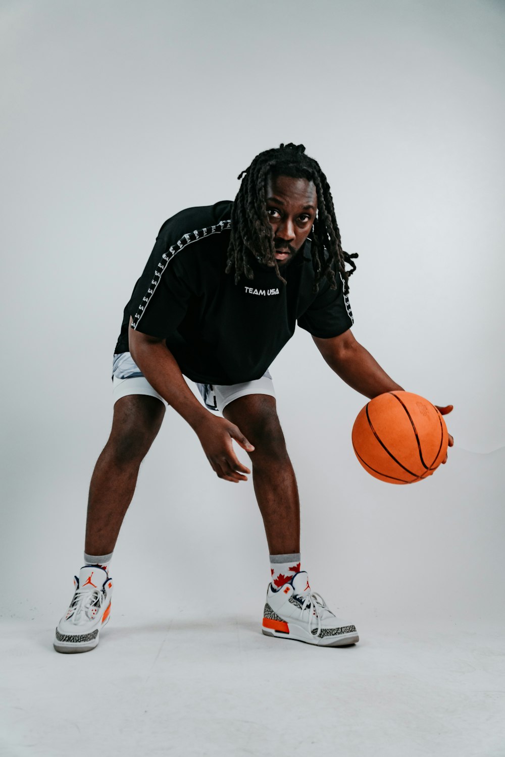 a man playing basketball