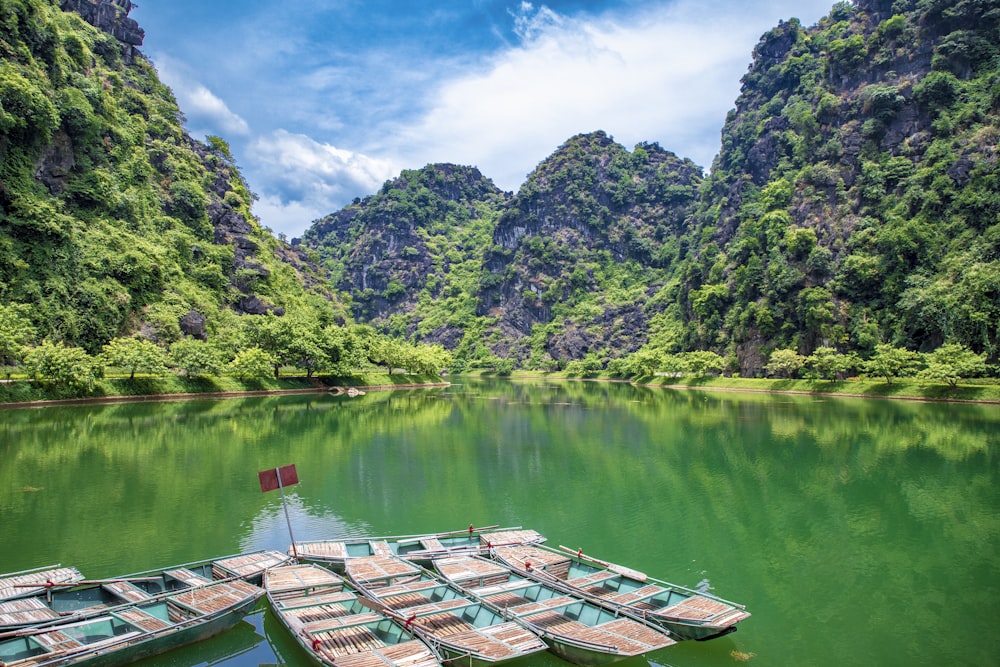 a group of boats on a lake