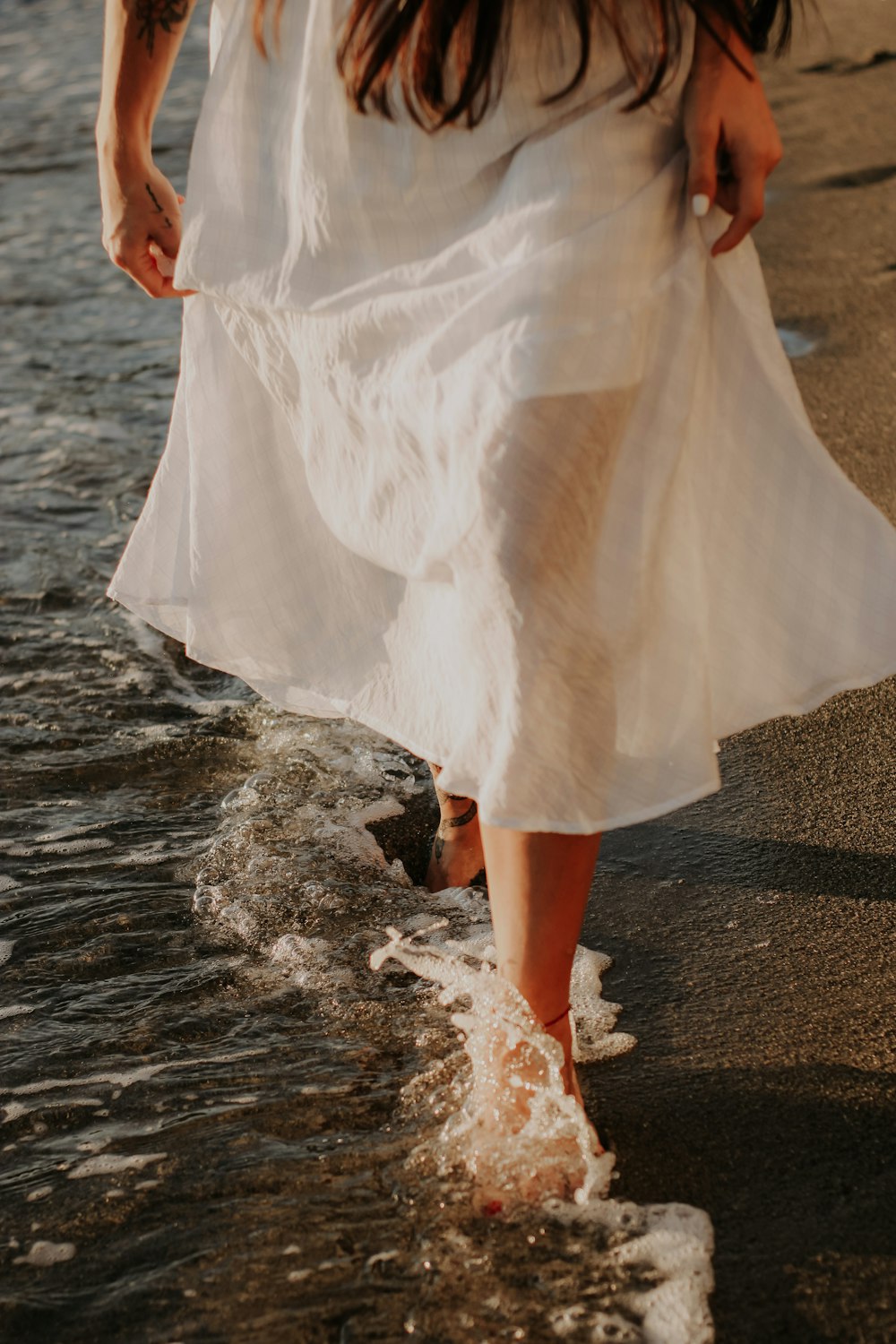 a person wearing a white dress