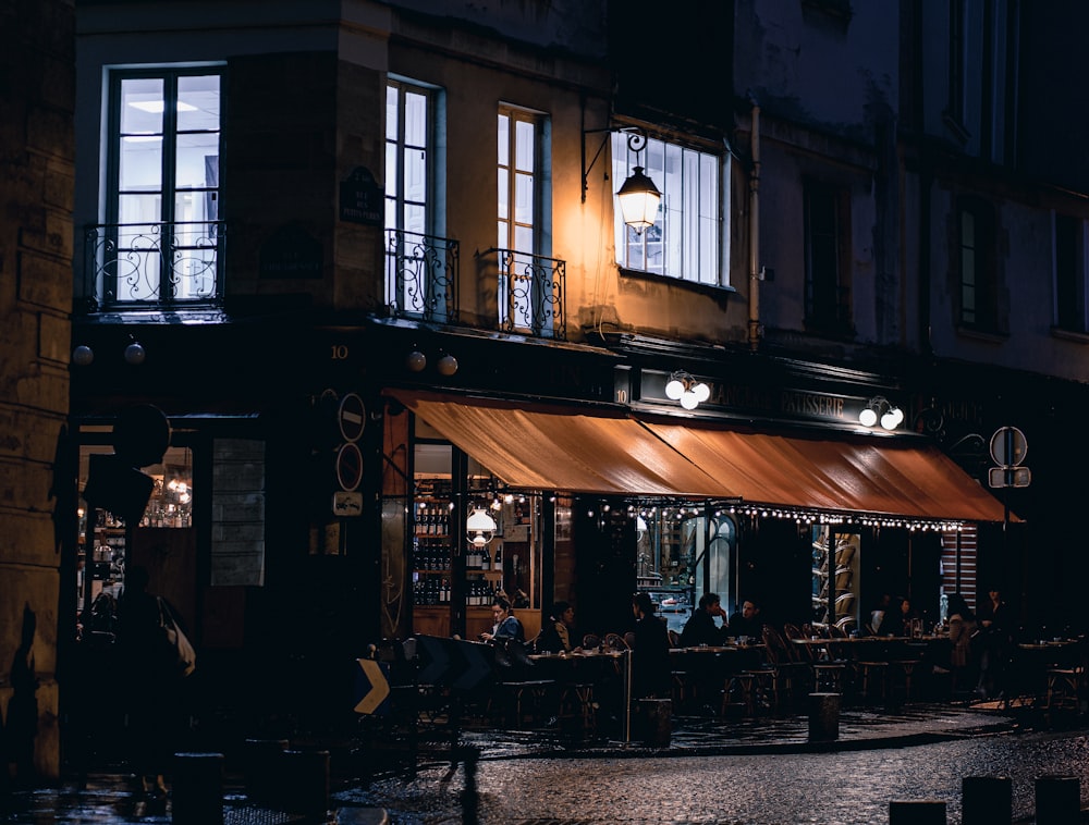 a restaurant with people sitting at tables