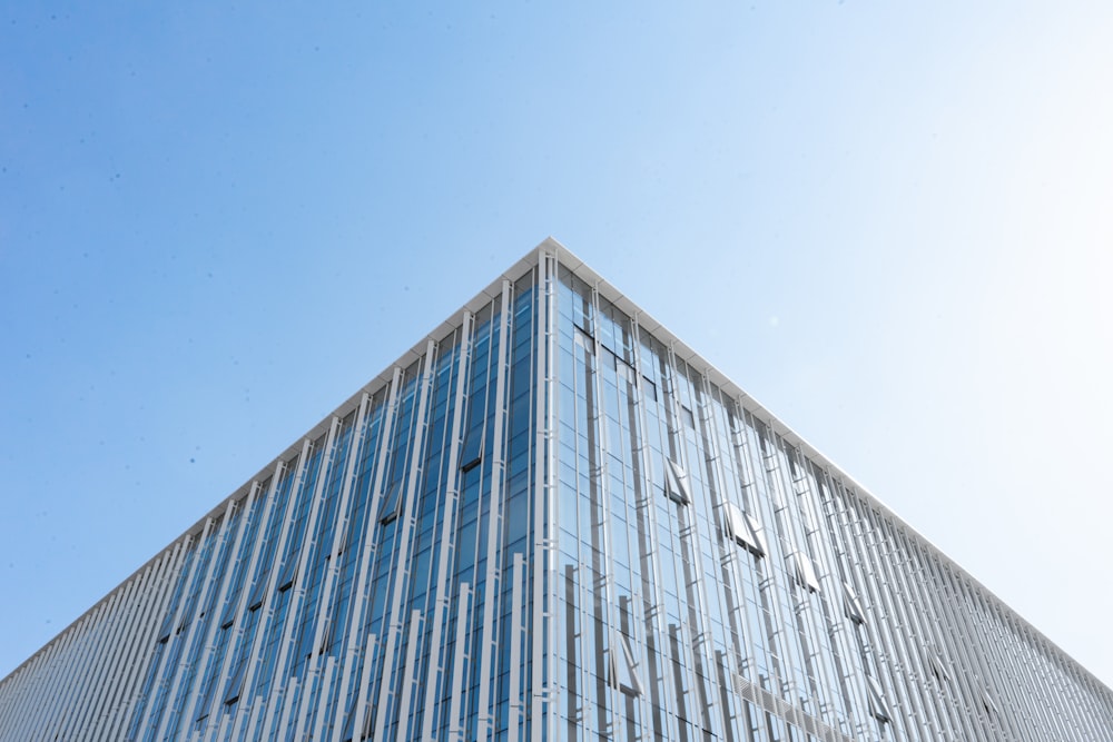 a tall building with a blue sky