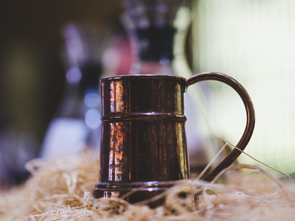 a glass mug on a table