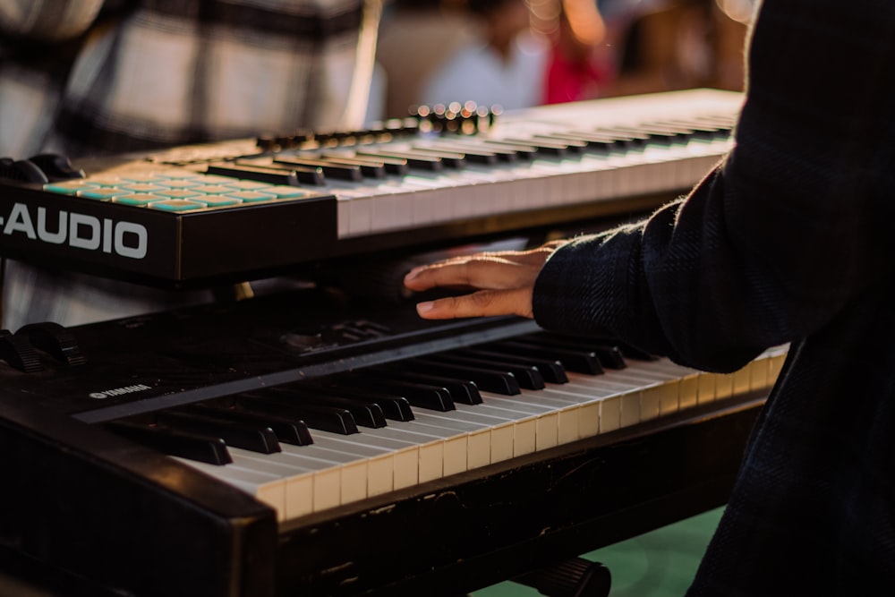 a person playing a piano