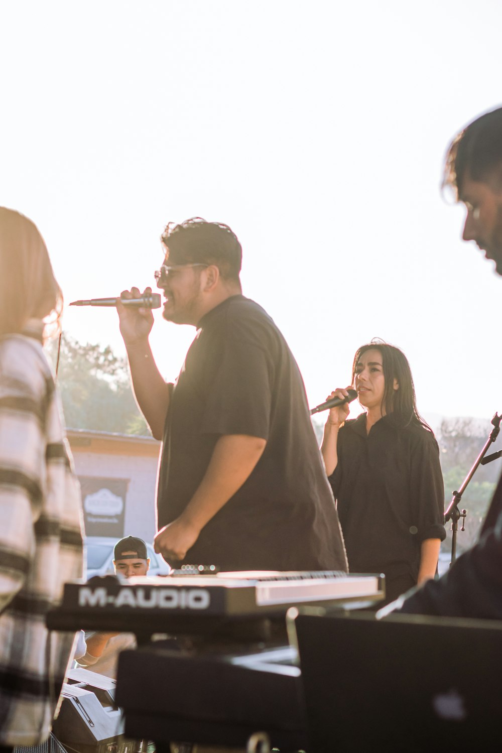 a person singing into a microphone