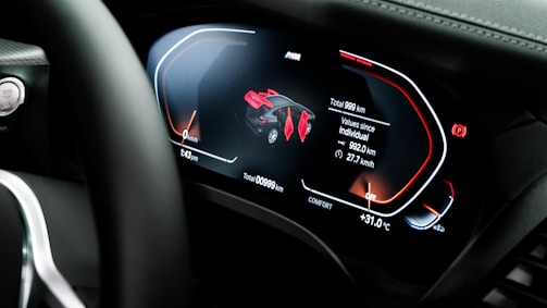 a car dashboard with a digital display