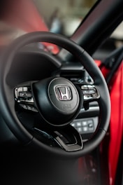 a steering wheel and dashboard of a car
