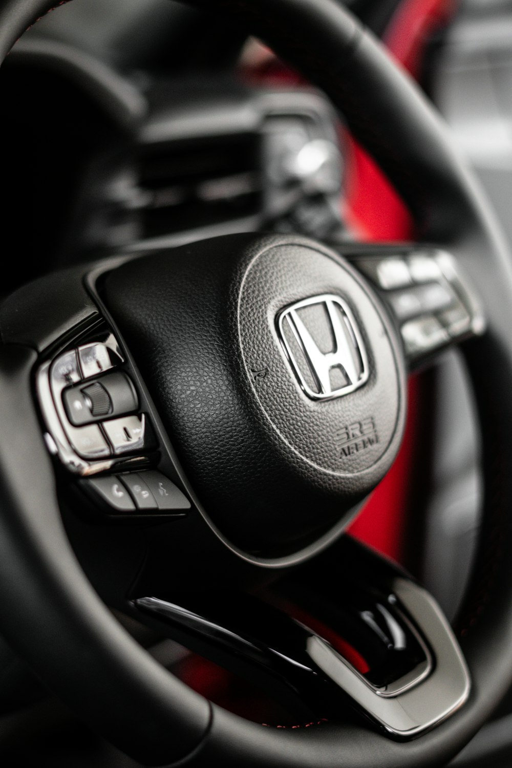 a close up of a steering wheel