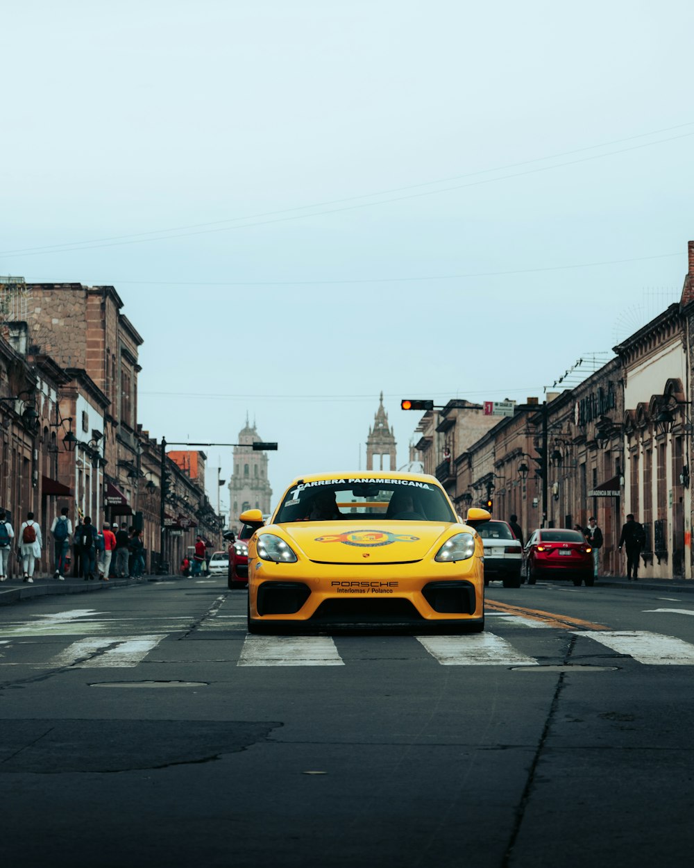 a yellow taxi on a street