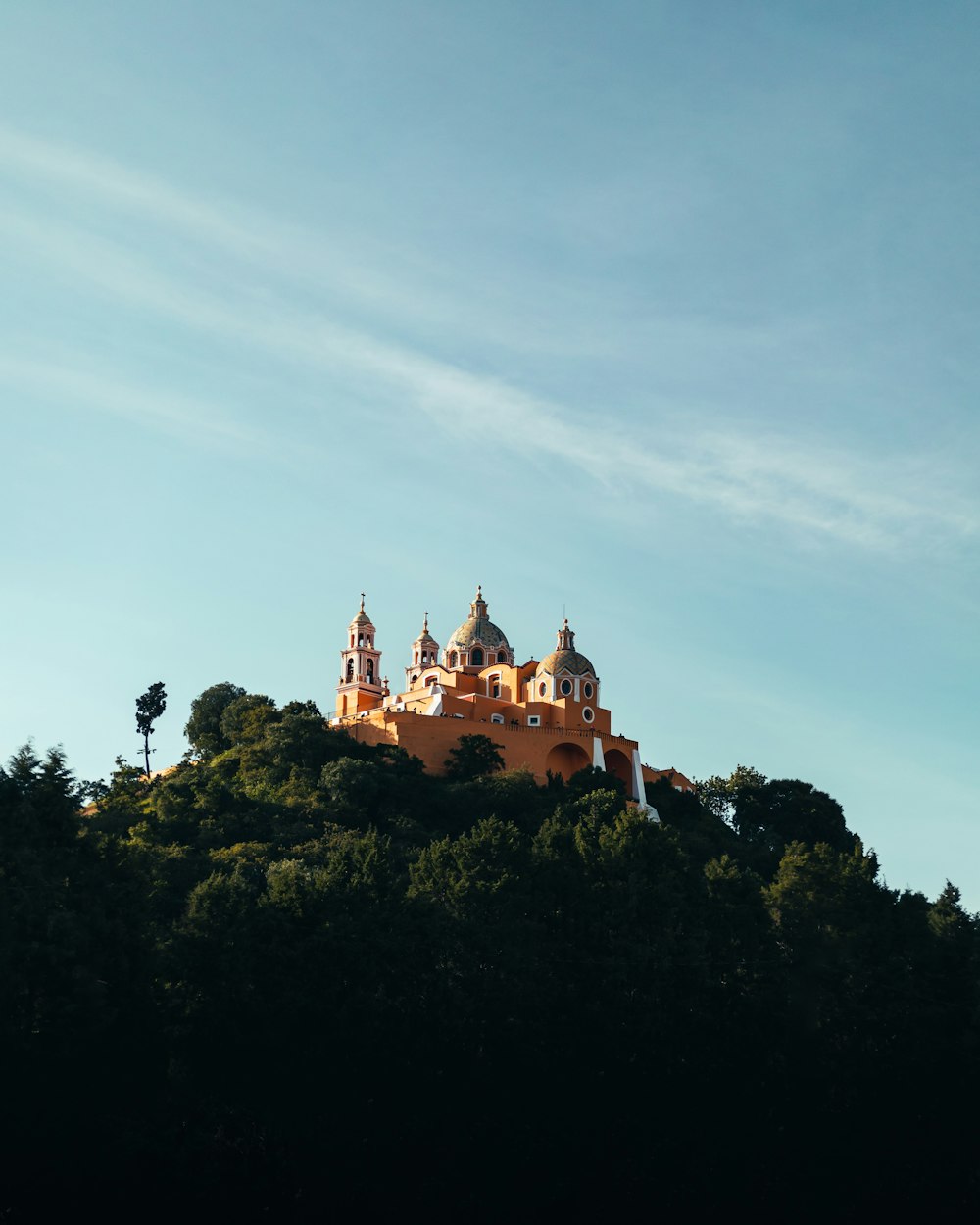 a large building on top of a hill