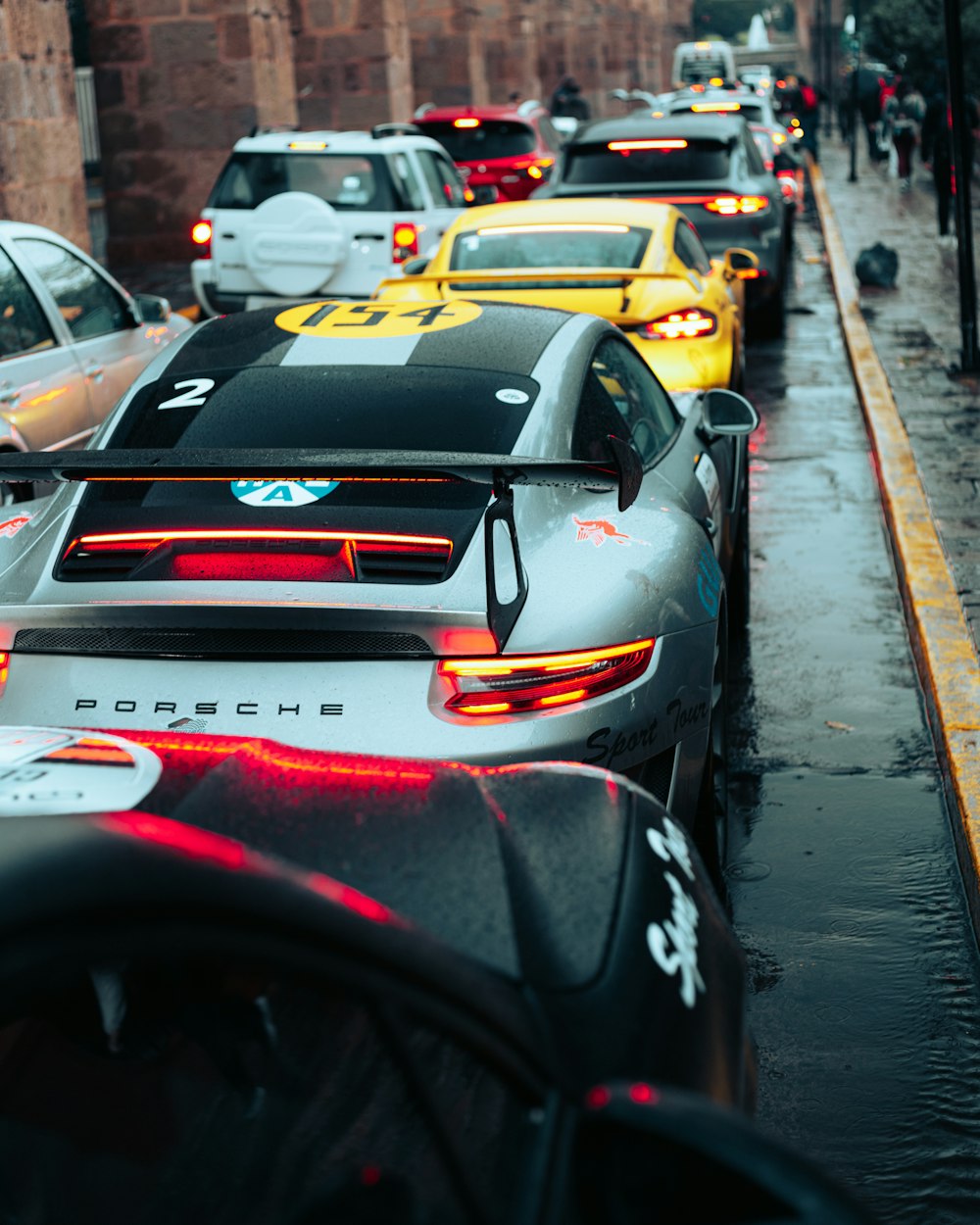 a group of cars on a street