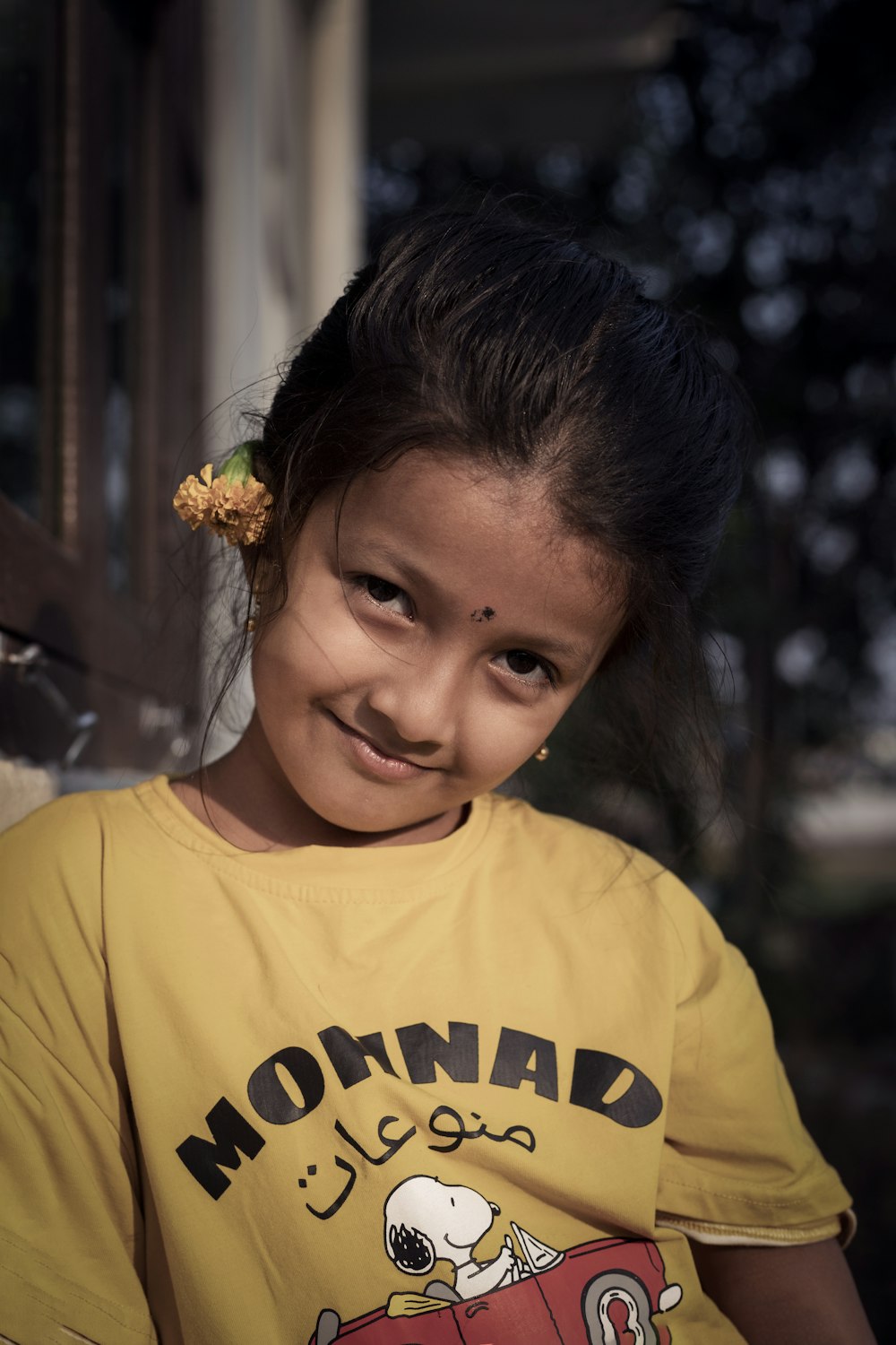 a girl smiling for the camera