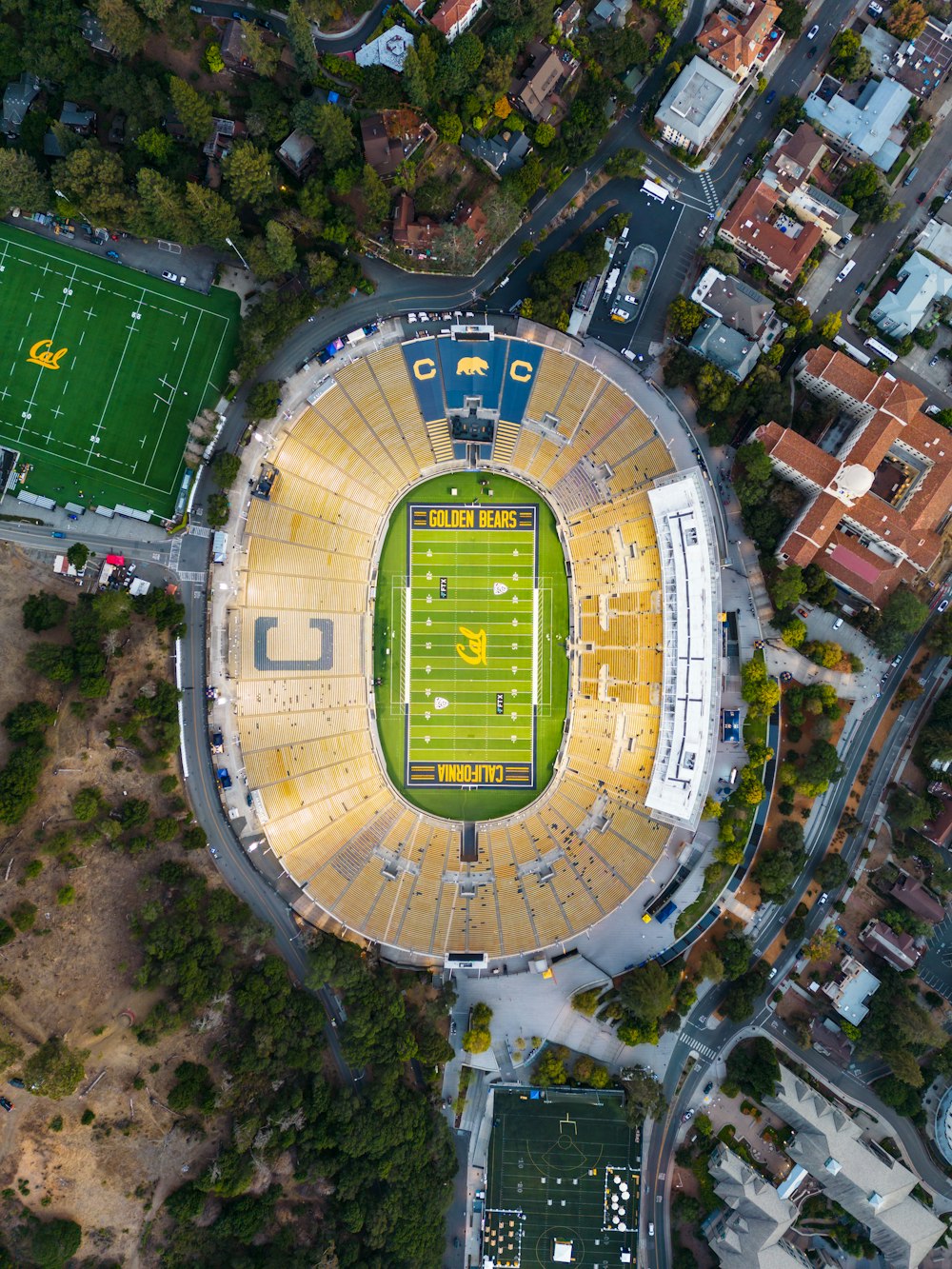 a large stadium with a field in the middle