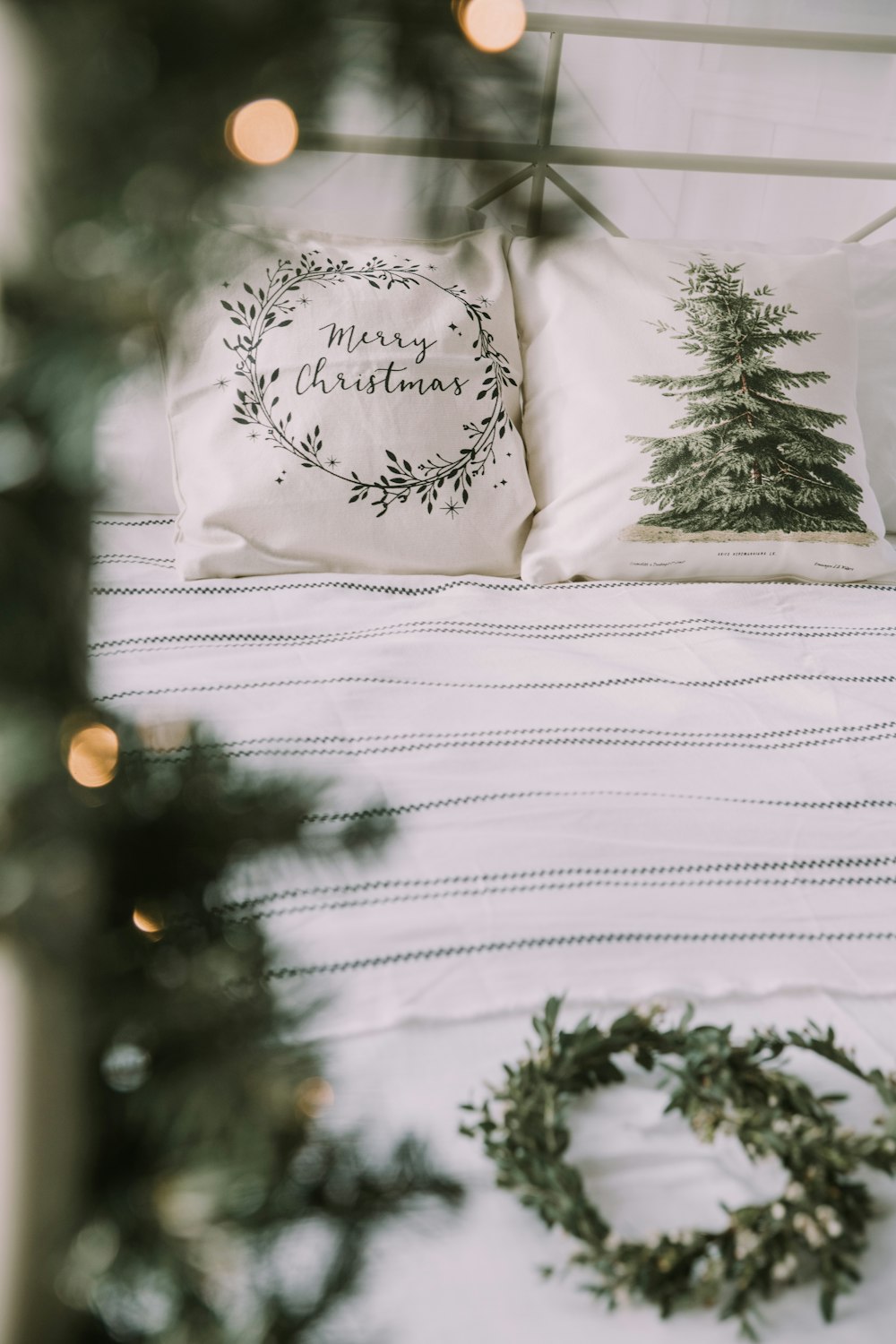 a white pillow on a bed