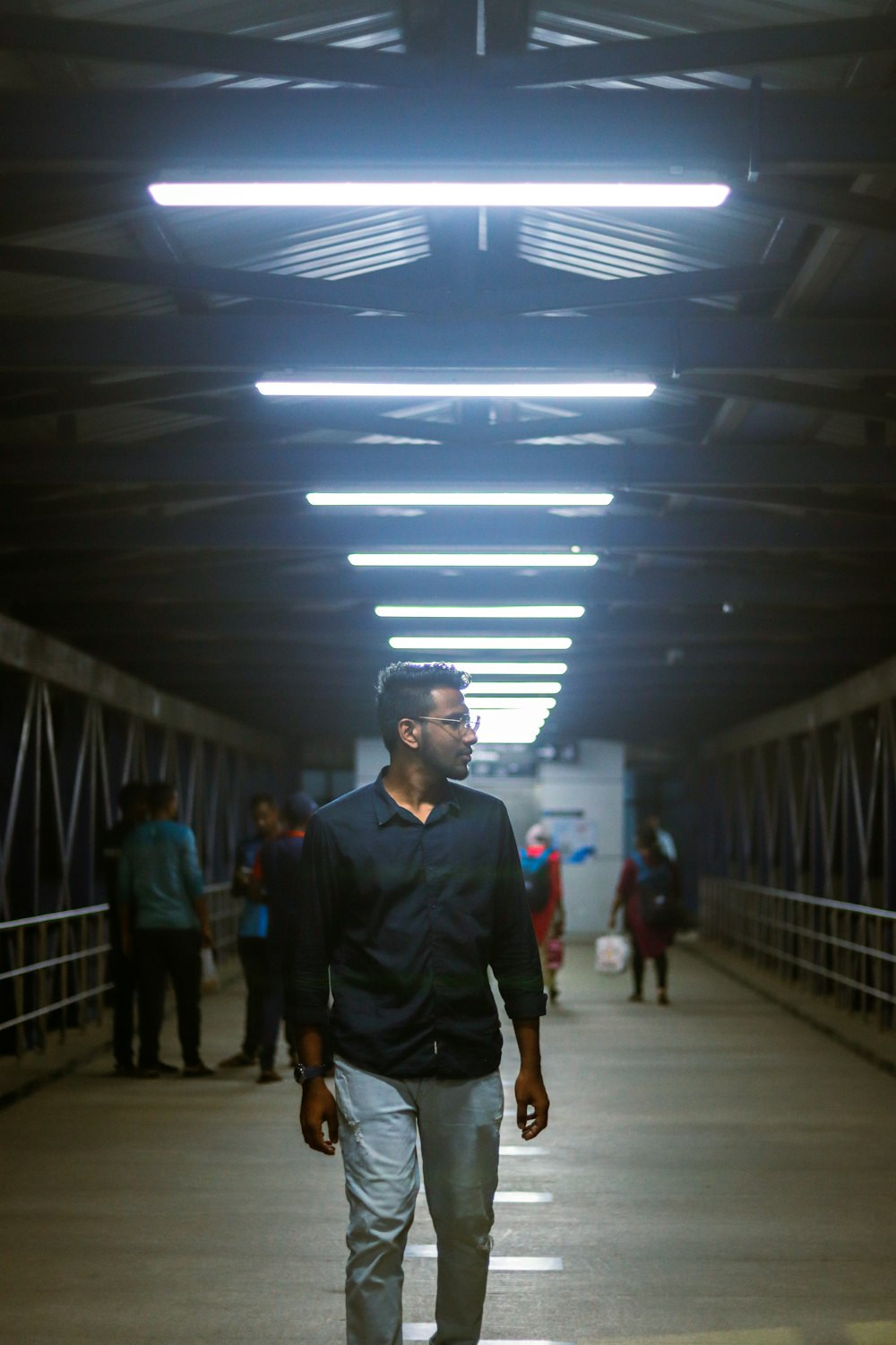 a man standing in a hallway