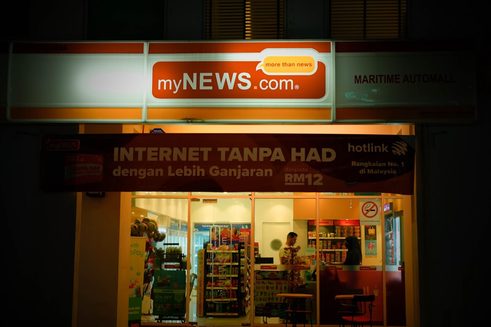 a store front with a sign