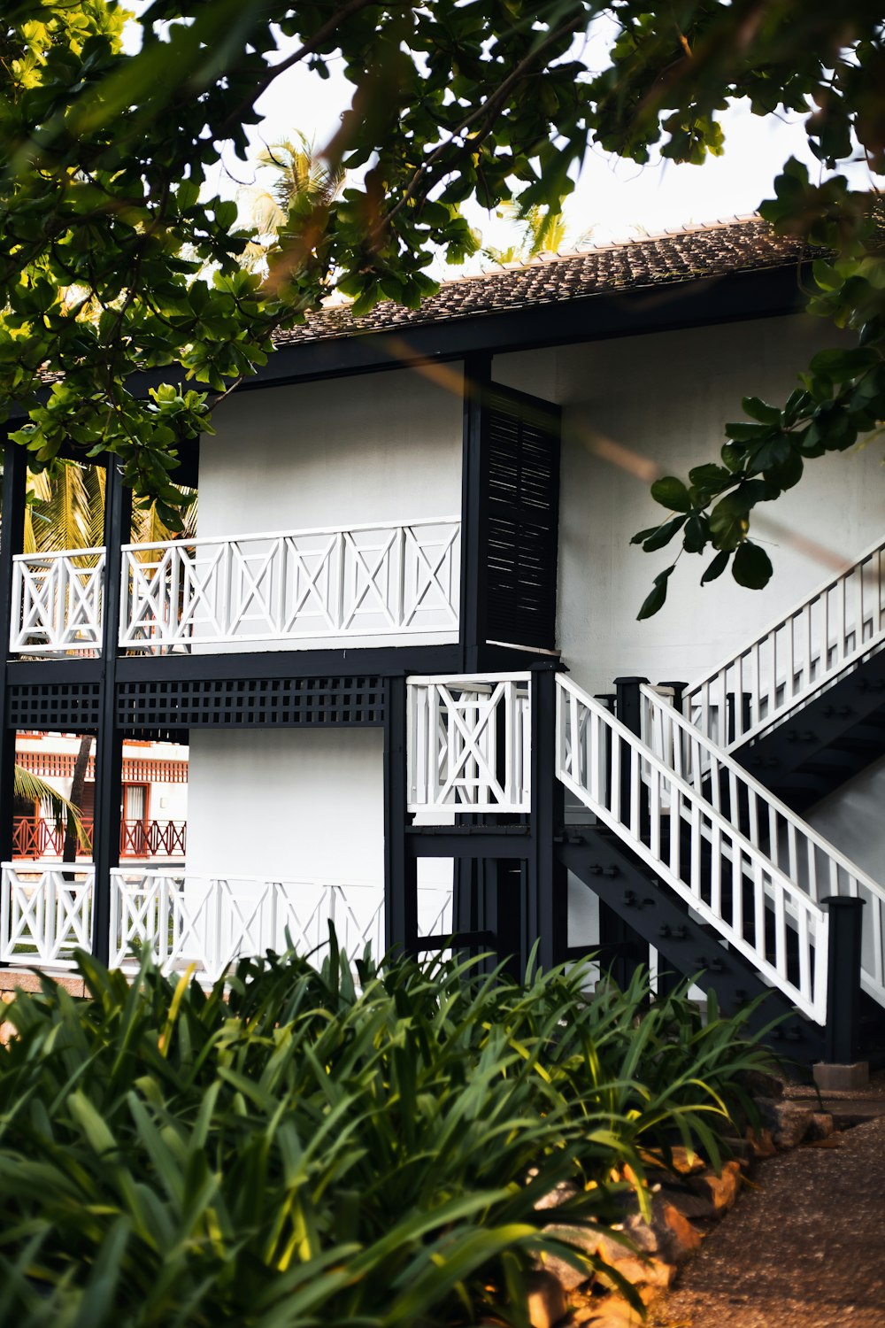 a house with a white fence and a white picket fence