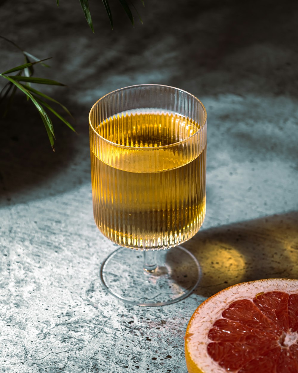 a glass of beer on a table