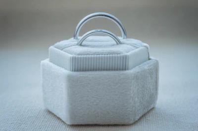 A suede-covered necklace box with a soft-touch finish and magnetic closure.