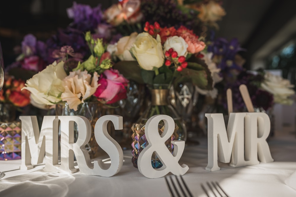 a vase of flowers on a table