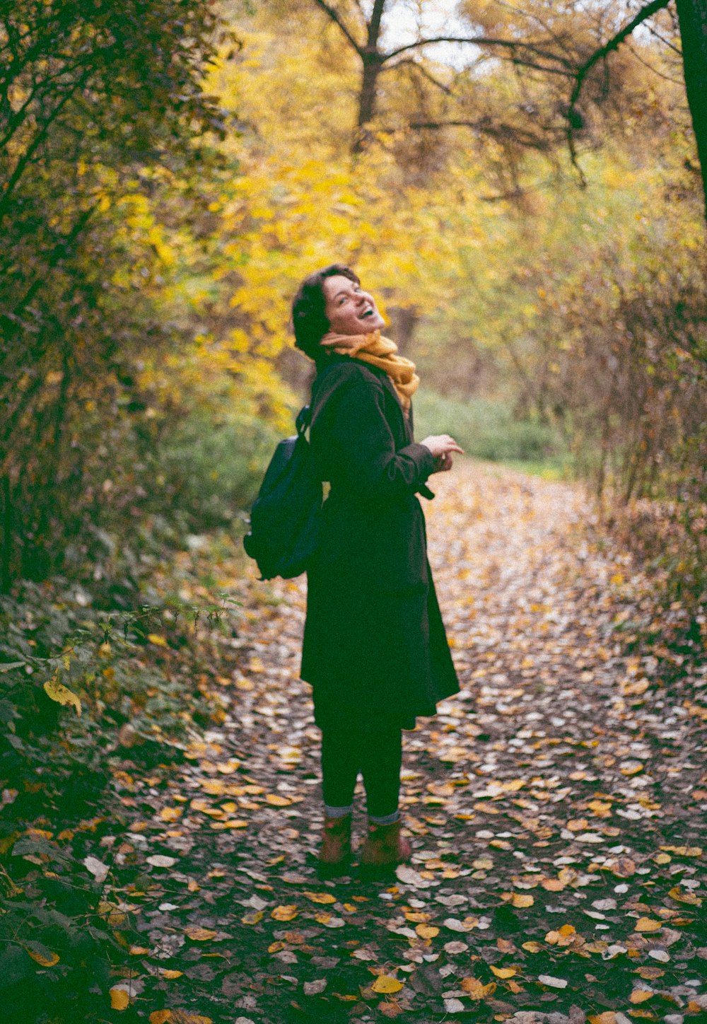 a person standing in a forest