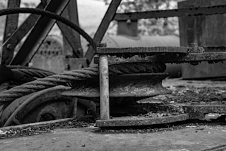 Close-up of mechanical gears and pulleys in lifting equipment.