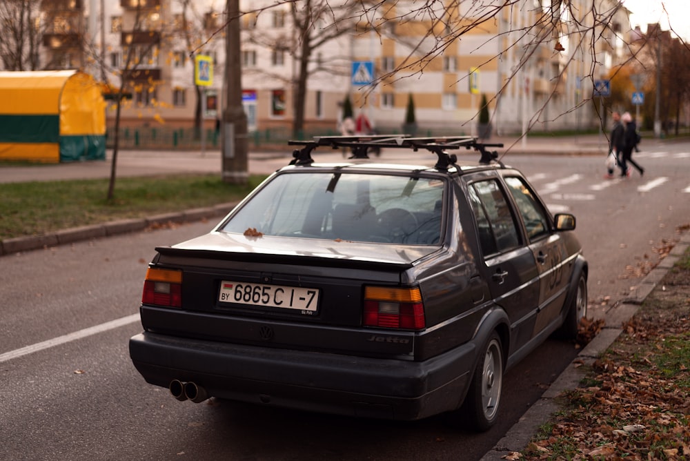 a car with a surfboard on top of it