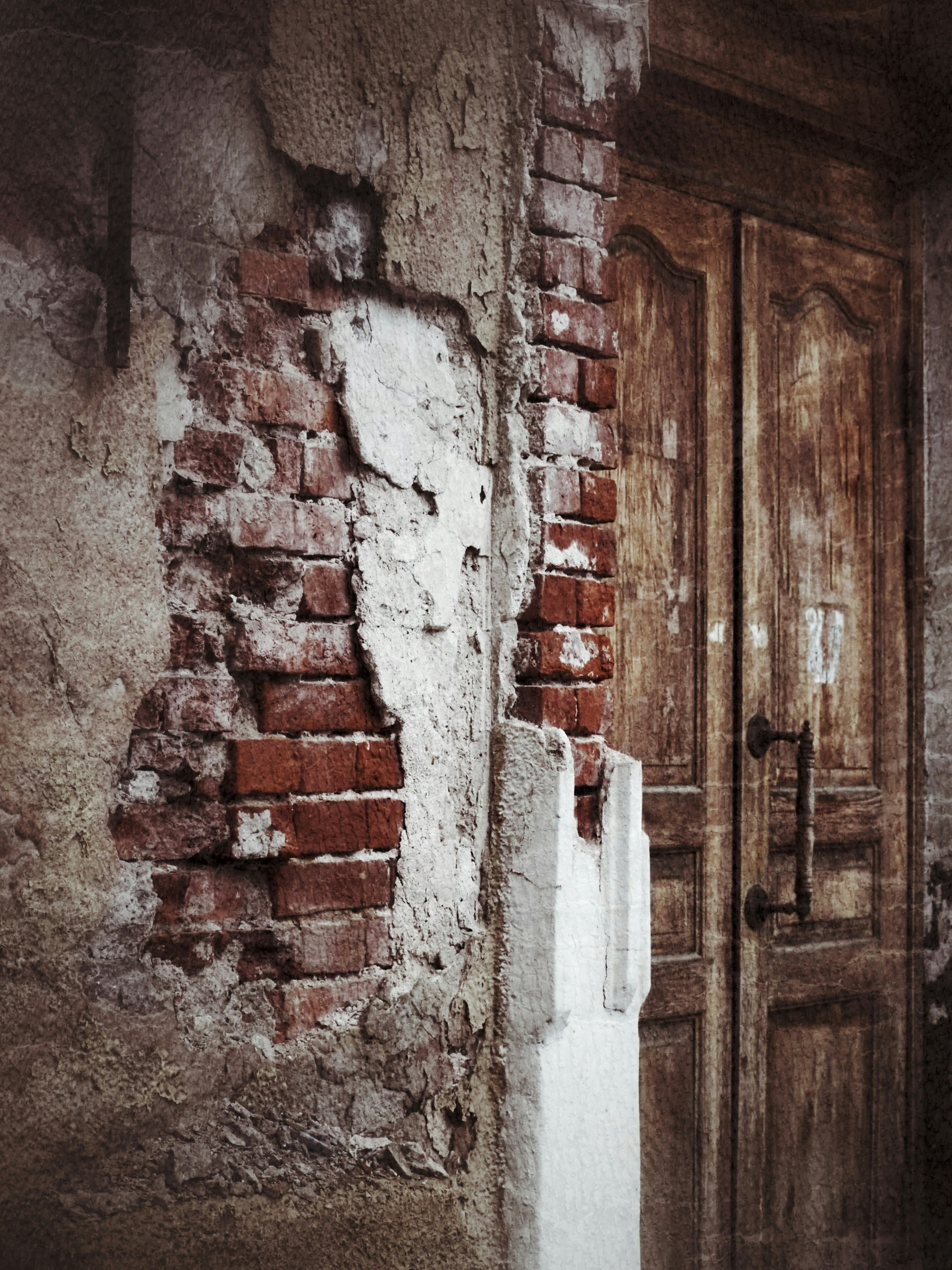 A door in a brick wall photo Free Moscow Image on Unsplash