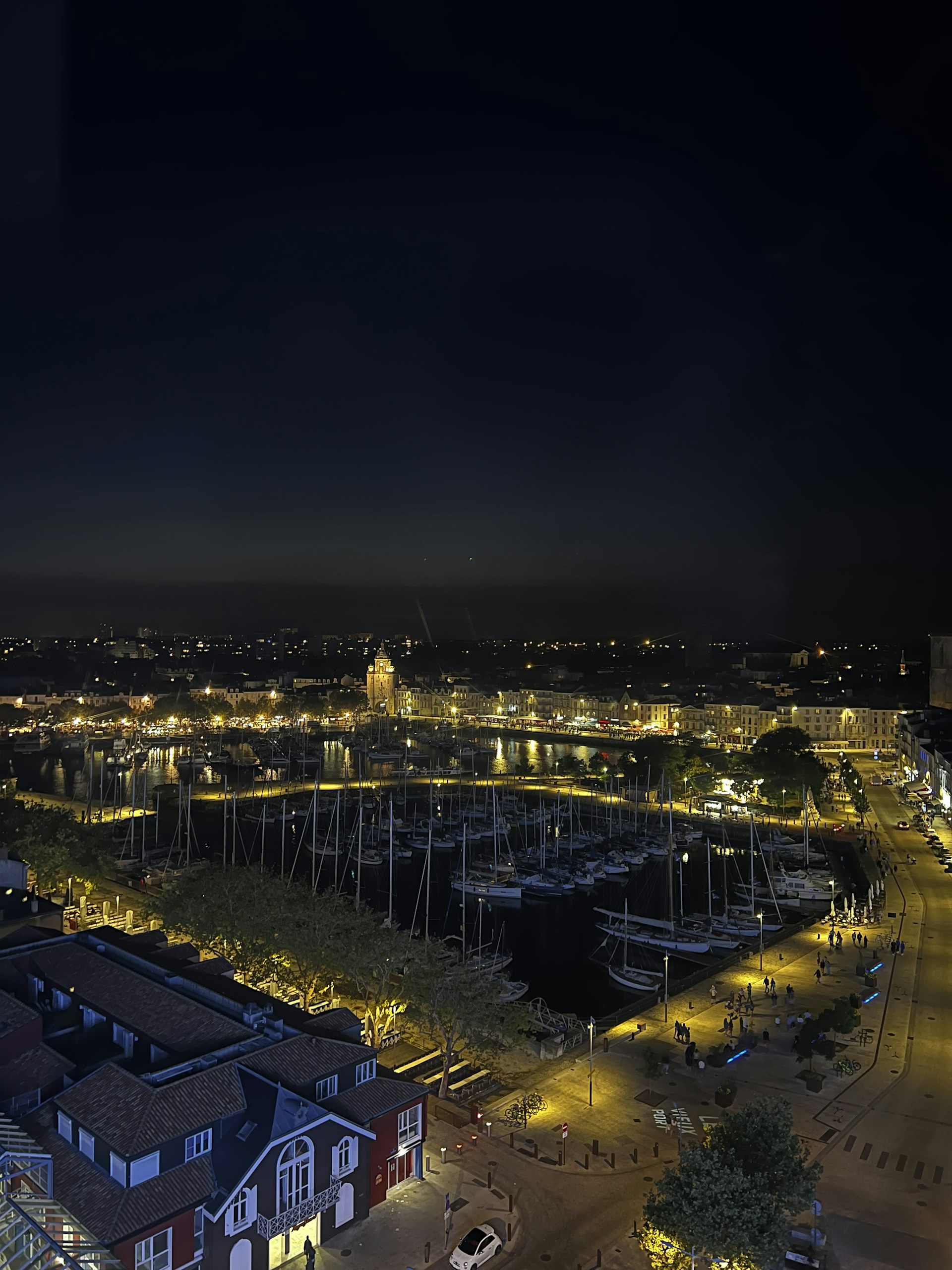 woman wearing yellow long-sleeved dress under white clouds and blue sky during daytime