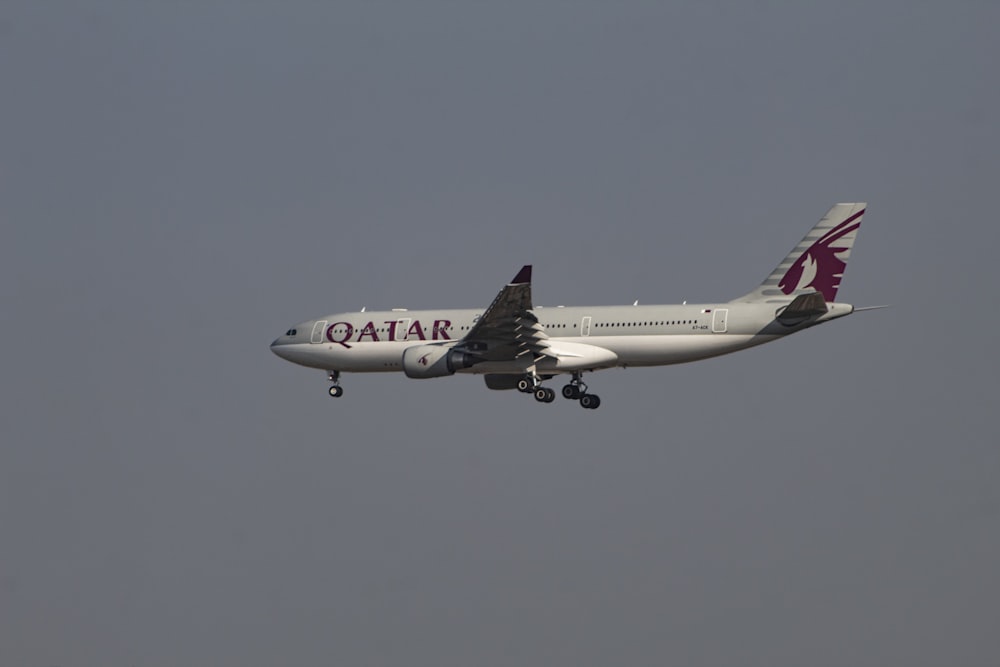 a large airplane flying in the sky