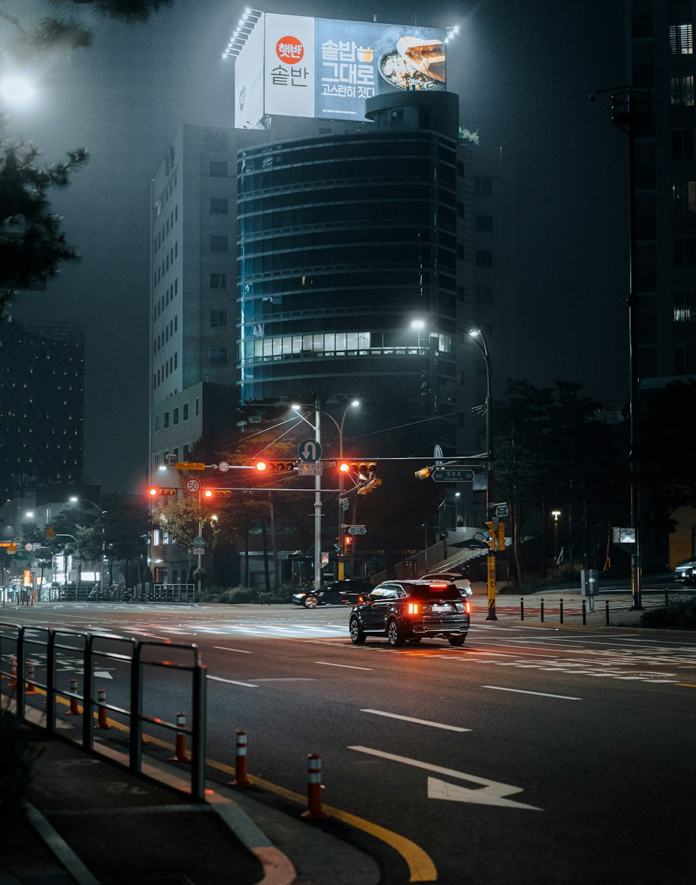 a car driving down a street